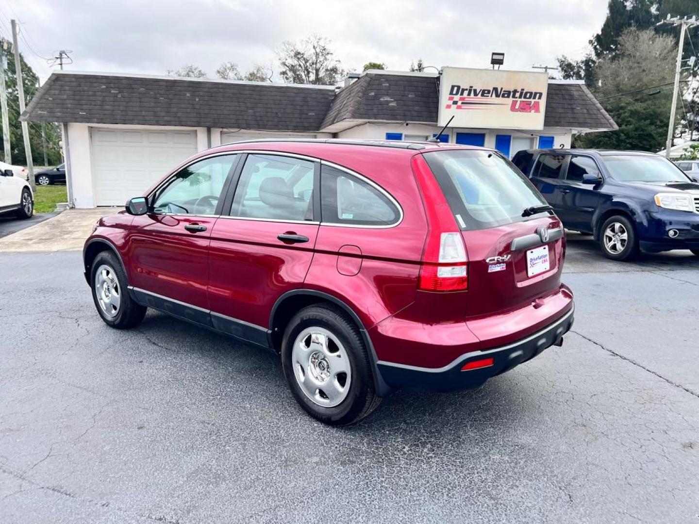 2009 MAROON HONDA CR-V LX (JHLRE38319C) with an 2.4L engine, Automatic transmission, located at 2929 9th St. West, Bradenton, 34205, (941) 242-2810, 27.473591, -82.570679 - Photo#6