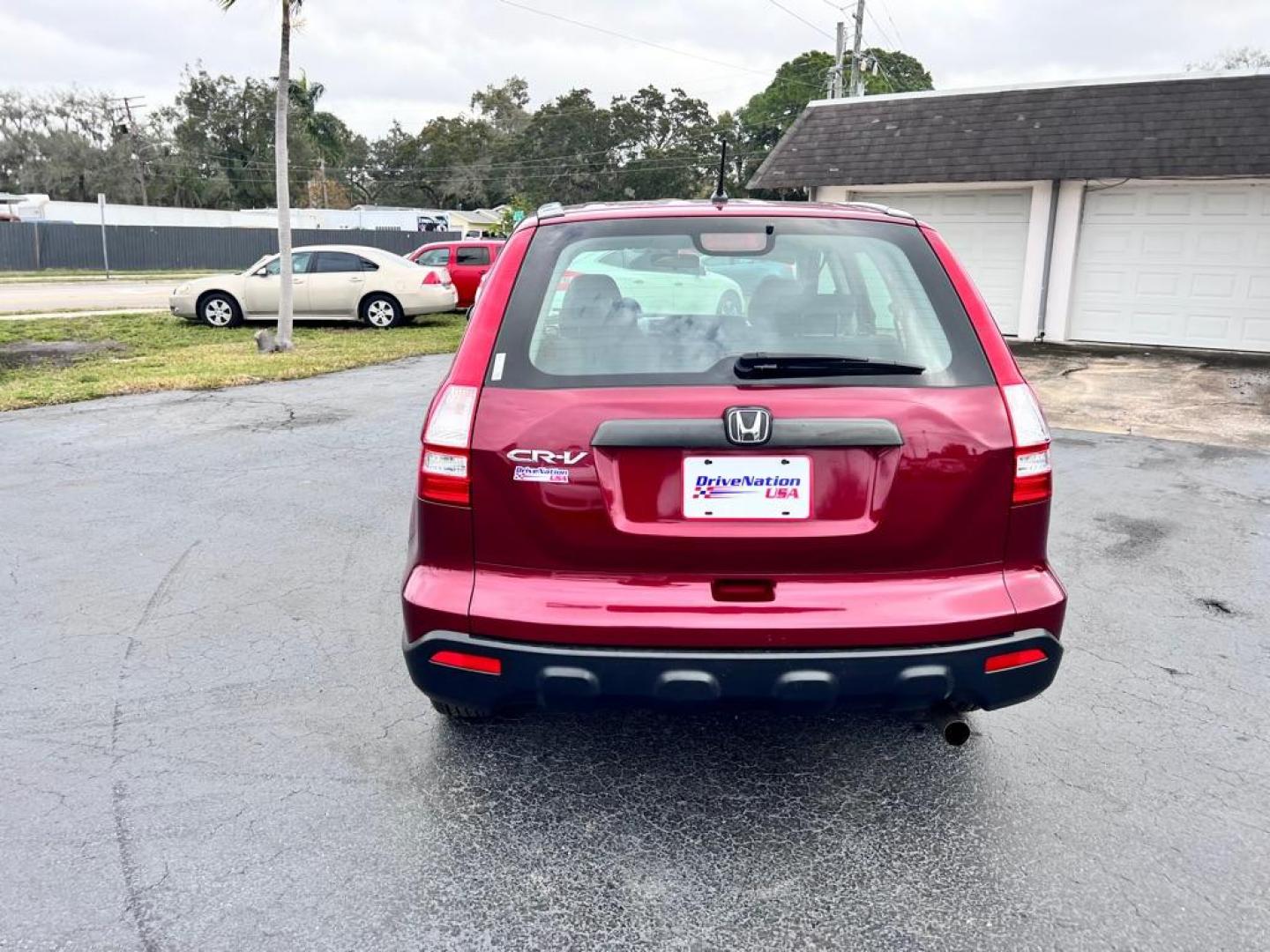 2009 MAROON HONDA CR-V LX (JHLRE38319C) with an 2.4L engine, Automatic transmission, located at 2929 9th St. West, Bradenton, 34205, (941) 242-2810, 27.473591, -82.570679 - Photo#7