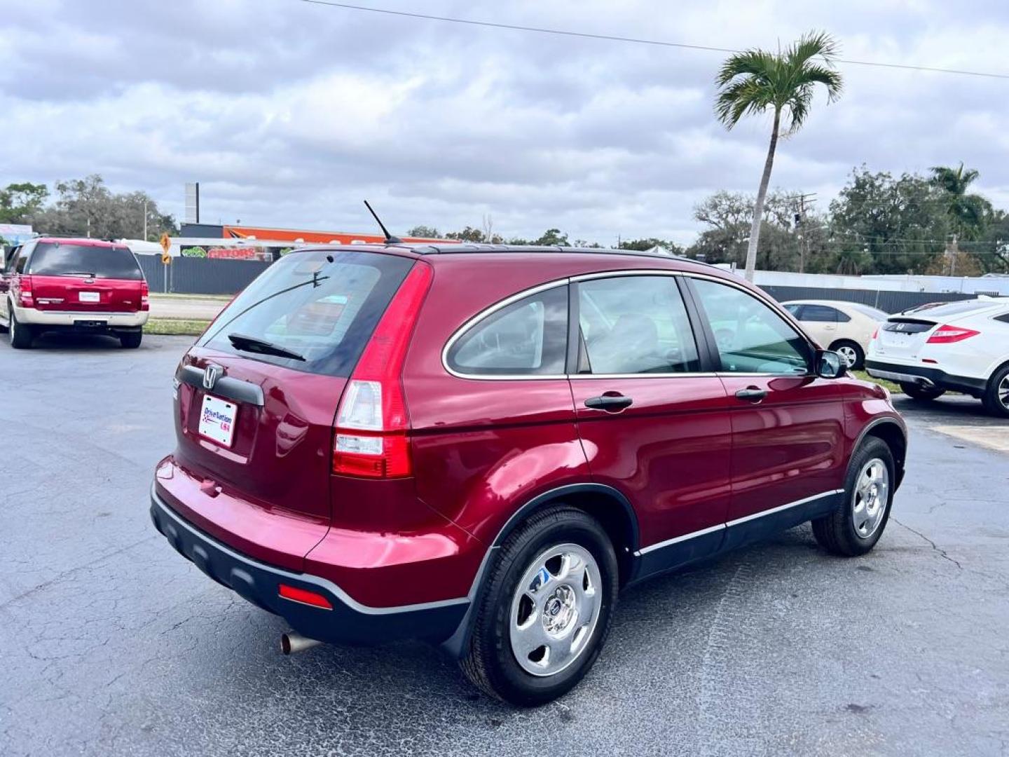 2009 MAROON HONDA CR-V LX (JHLRE38319C) with an 2.4L engine, Automatic transmission, located at 2929 9th St. West, Bradenton, 34205, (941) 242-2810, 27.473591, -82.570679 - Photo#8