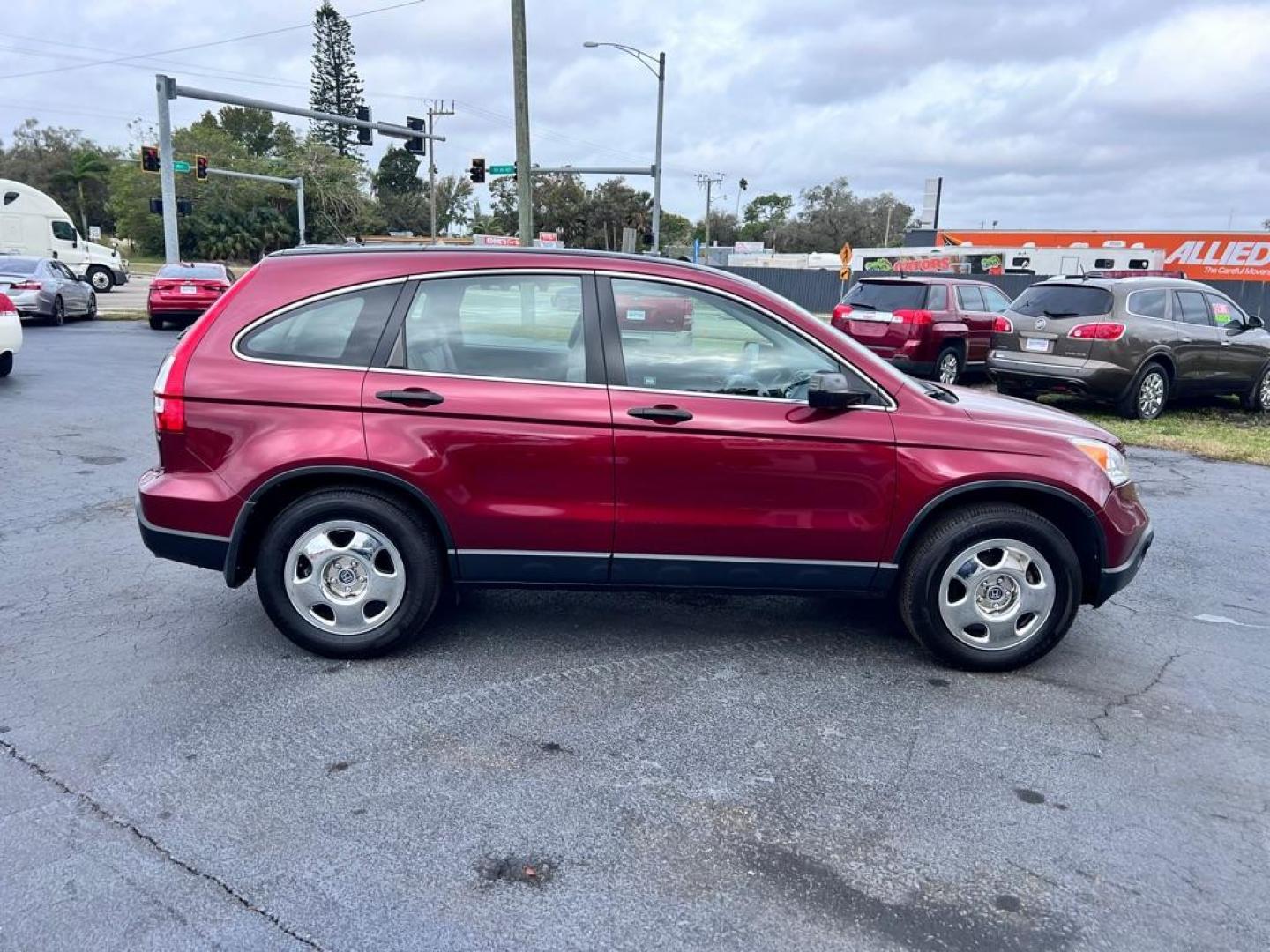 2009 MAROON HONDA CR-V LX (JHLRE38319C) with an 2.4L engine, Automatic transmission, located at 2929 9th St. West, Bradenton, 34205, (941) 242-2810, 27.473591, -82.570679 - Photo#9