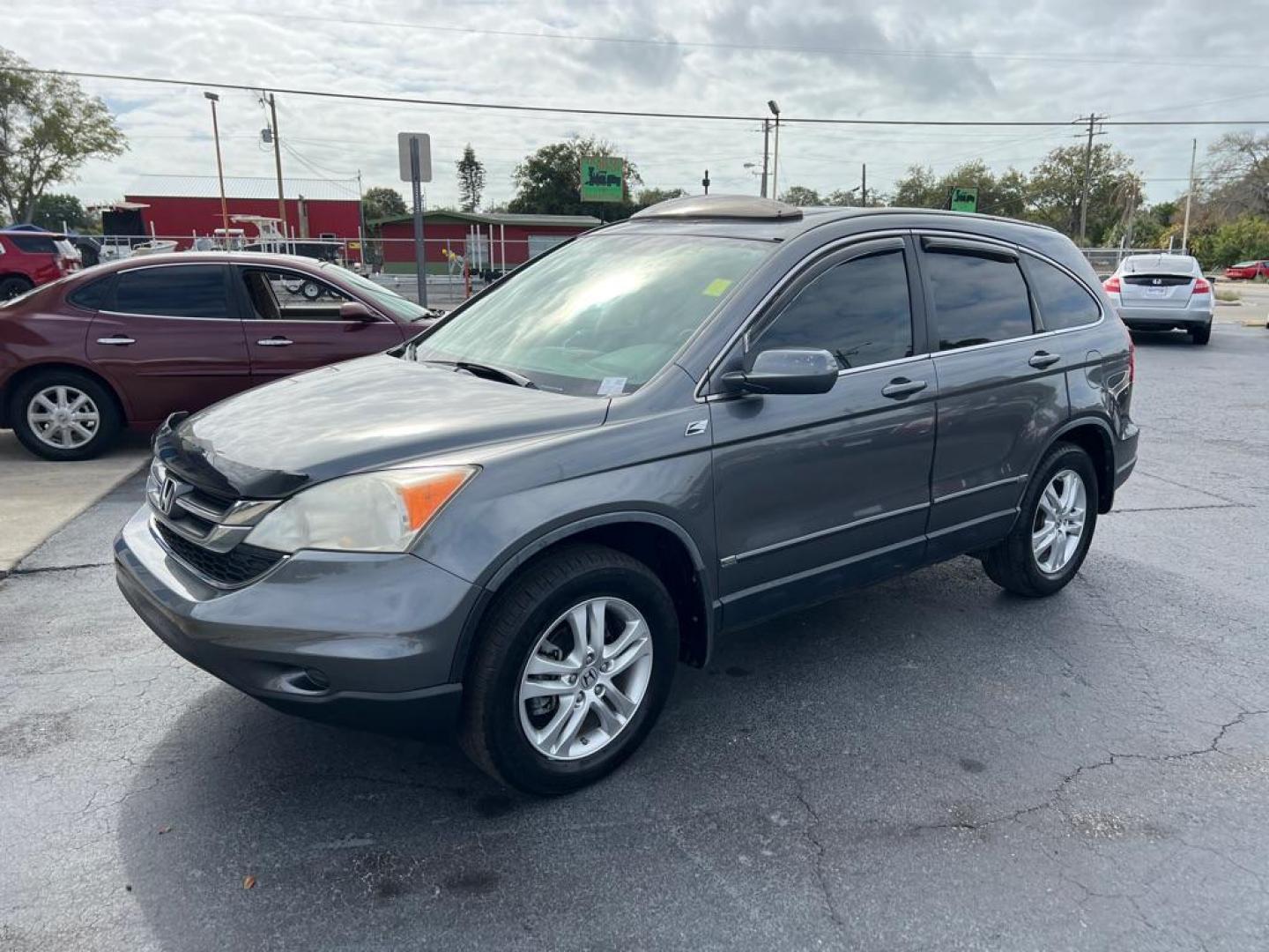 2011 SILVER HONDA CR-V EXL (JHLRE3H79BC) with an 2.4L engine, Automatic transmission, located at 2929 9th St. West, Bradenton, 34205, (941) 242-2810, 27.473591, -82.570679 - Photo#5