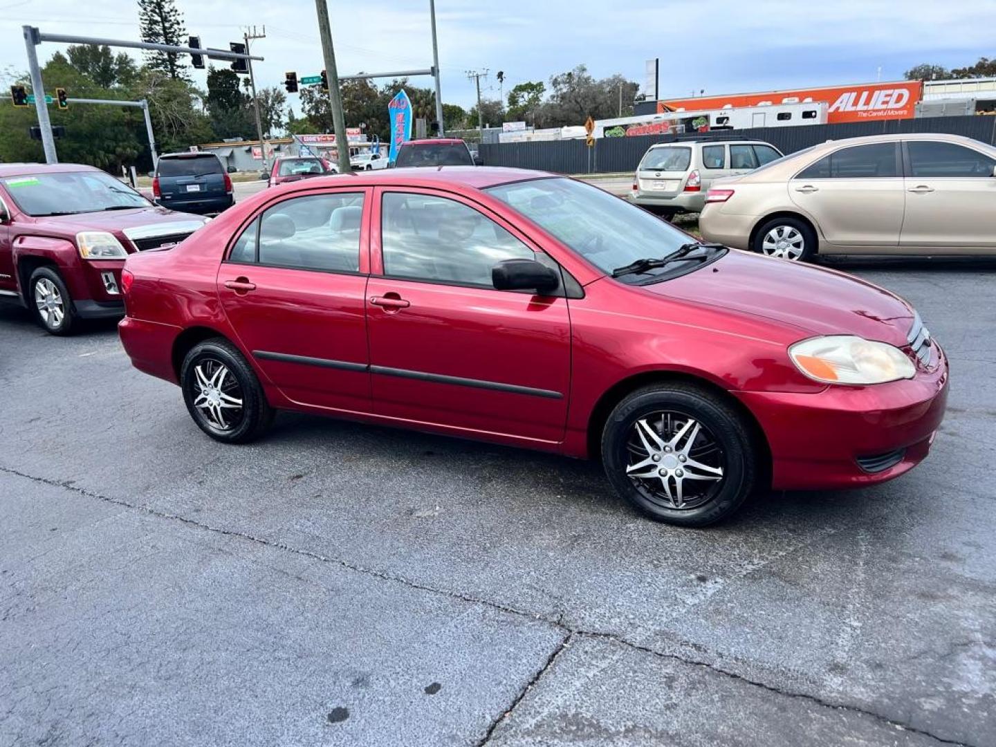 2004 RED TOYOTA COROLLA CE (2T1BR32E14C) with an 1.8L engine, Automatic transmission, located at 2929 9th St. West, Bradenton, 34205, (941) 242-2810, 27.473591, -82.570679 - Photo#0