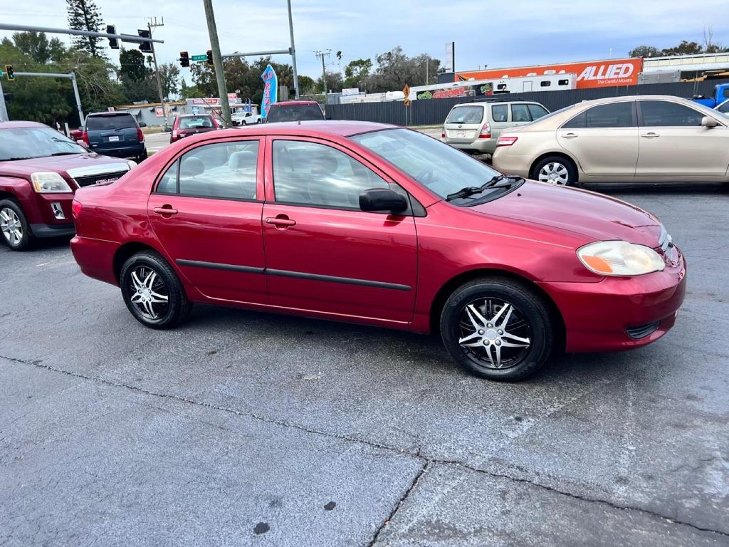 2004 RED TOYOTA COROLLA CE (2T1BR32E14C) with an 1.8L engine, Automatic transmission, located at 2929 9th St. West, Bradenton, 34205, (941) 242-2810, 27.473591, -82.570679 - Photo#1