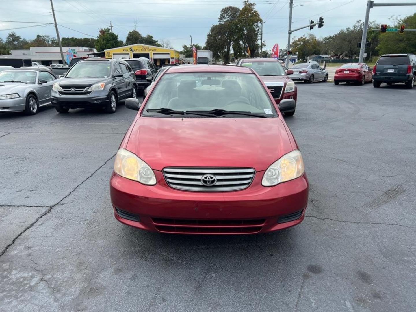 2004 RED TOYOTA COROLLA CE (2T1BR32E14C) with an 1.8L engine, Automatic transmission, located at 2929 9th St. West, Bradenton, 34205, (941) 242-2810, 27.473591, -82.570679 - Photo#2