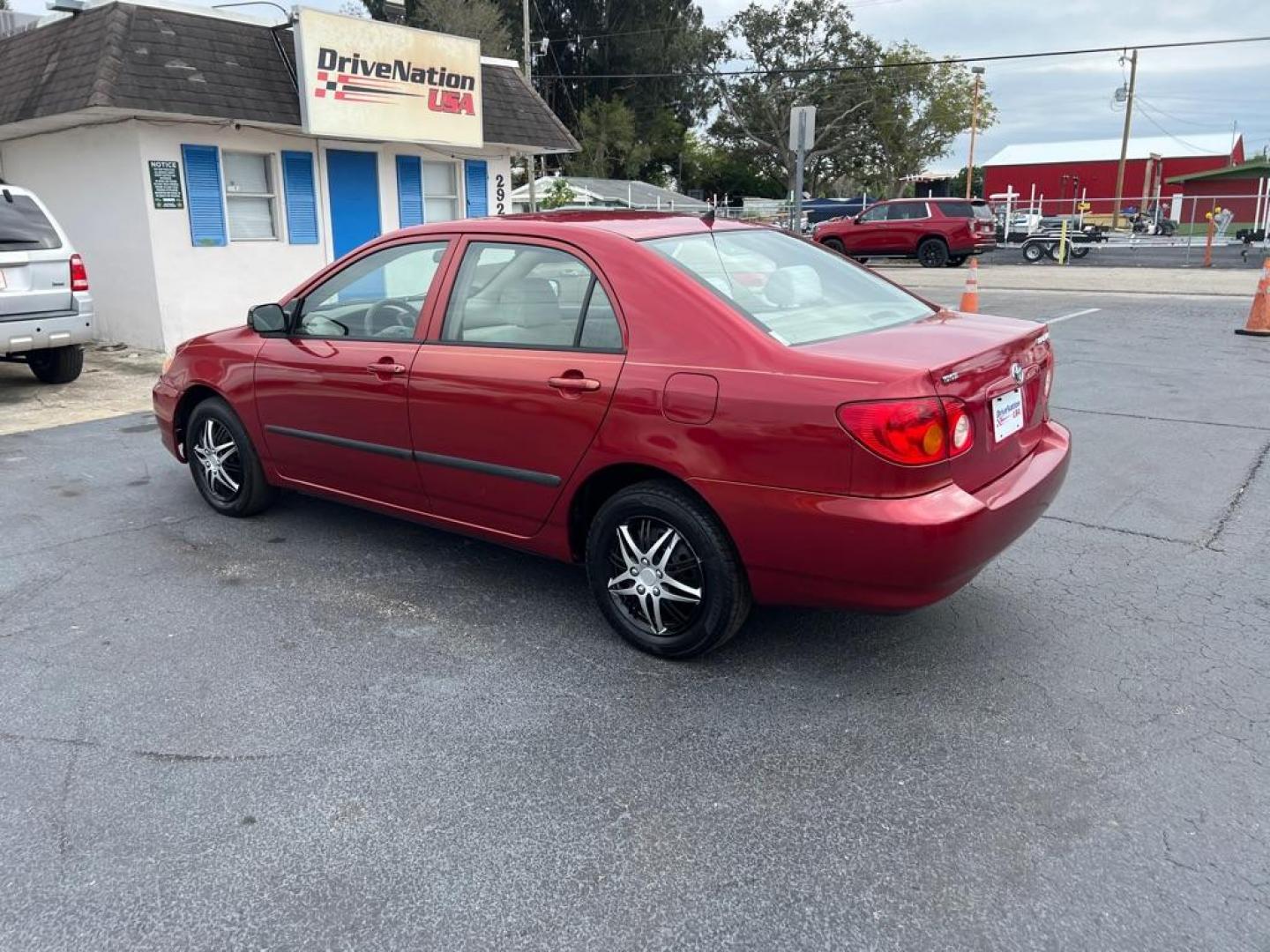 2004 RED TOYOTA COROLLA CE (2T1BR32E14C) with an 1.8L engine, Automatic transmission, located at 2929 9th St. West, Bradenton, 34205, (941) 242-2810, 27.473591, -82.570679 - Photo#5