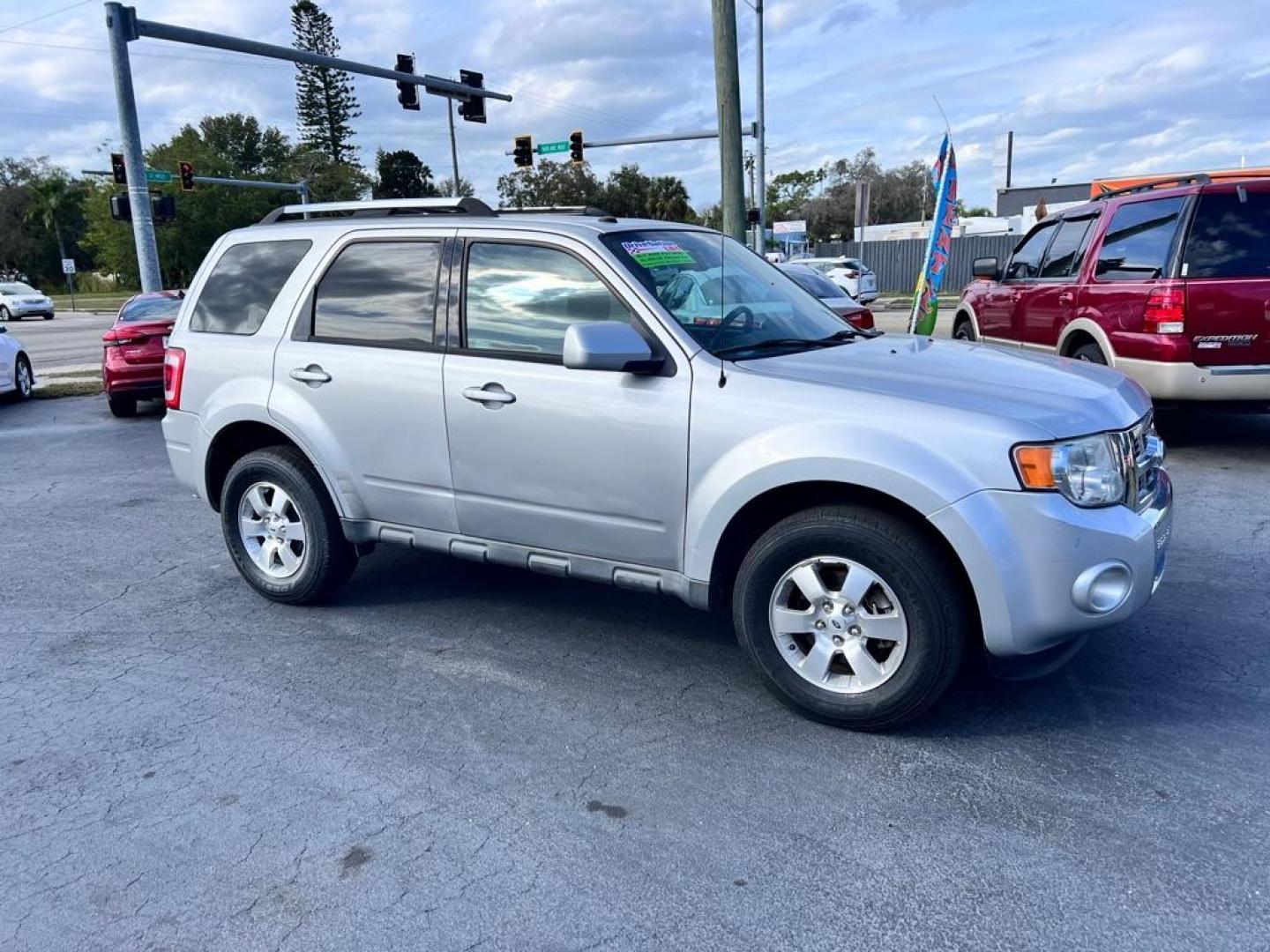 2010 SILVER FORD ESCAPE LIMITED (1FMCU0EG7AK) with an 3.0L engine, Automatic transmission, located at 2929 9th St. West, Bradenton, 34205, (941) 242-2810, 27.473591, -82.570679 - Photo#14