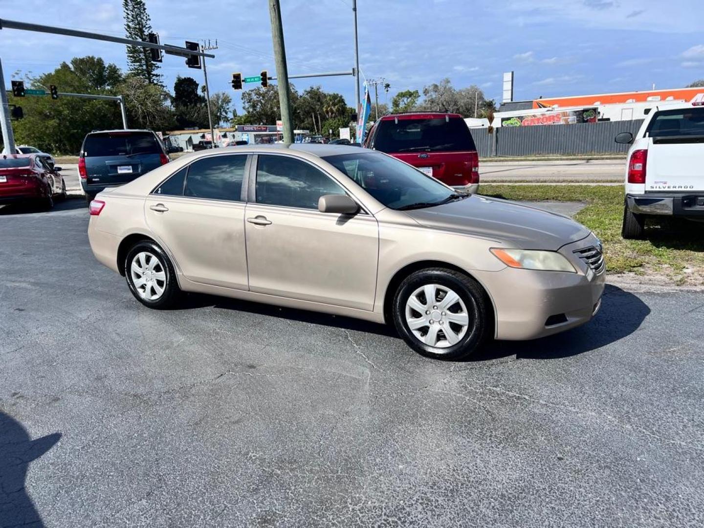 2008 GOLD TOYOTA CAMRY CE (4T1BE46K38U) with an 2.4L engine, Automatic transmission, located at 2929 9th St. West, Bradenton, 34205, (941) 242-2810, 27.473591, -82.570679 - Photo#0