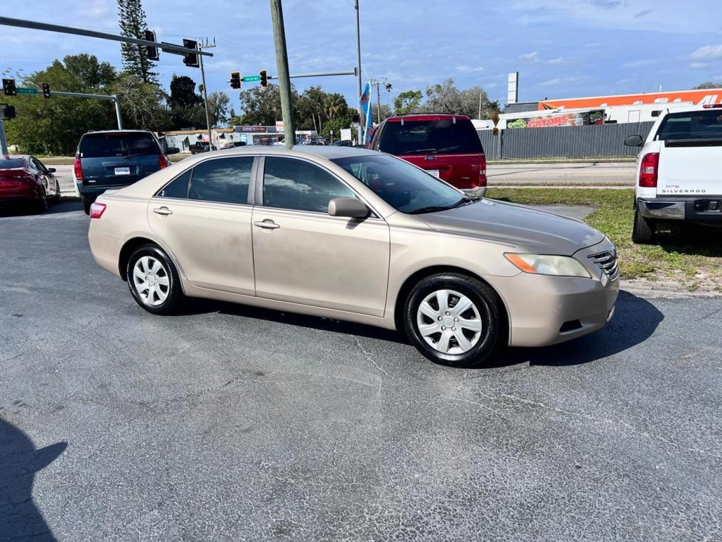 2008 GOLD TOYOTA CAMRY CE (4T1BE46K38U) with an 2.4L engine, Automatic transmission, located at 2929 9th St. West, Bradenton, 34205, (941) 242-2810, 27.473591, -82.570679 - Photo#1