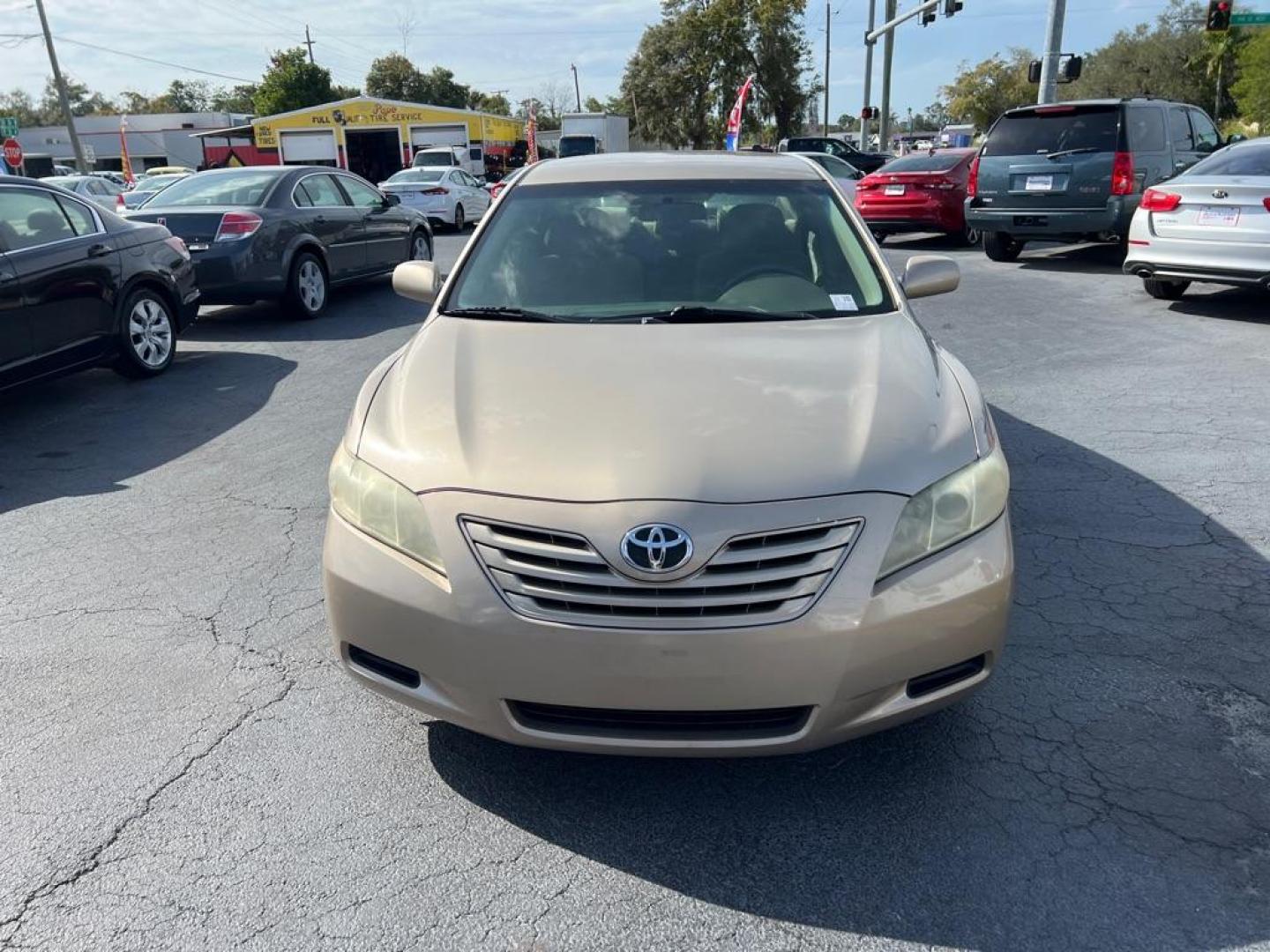 2008 GOLD TOYOTA CAMRY CE (4T1BE46K38U) with an 2.4L engine, Automatic transmission, located at 2929 9th St. West, Bradenton, 34205, (941) 242-2810, 27.473591, -82.570679 - Photo#2