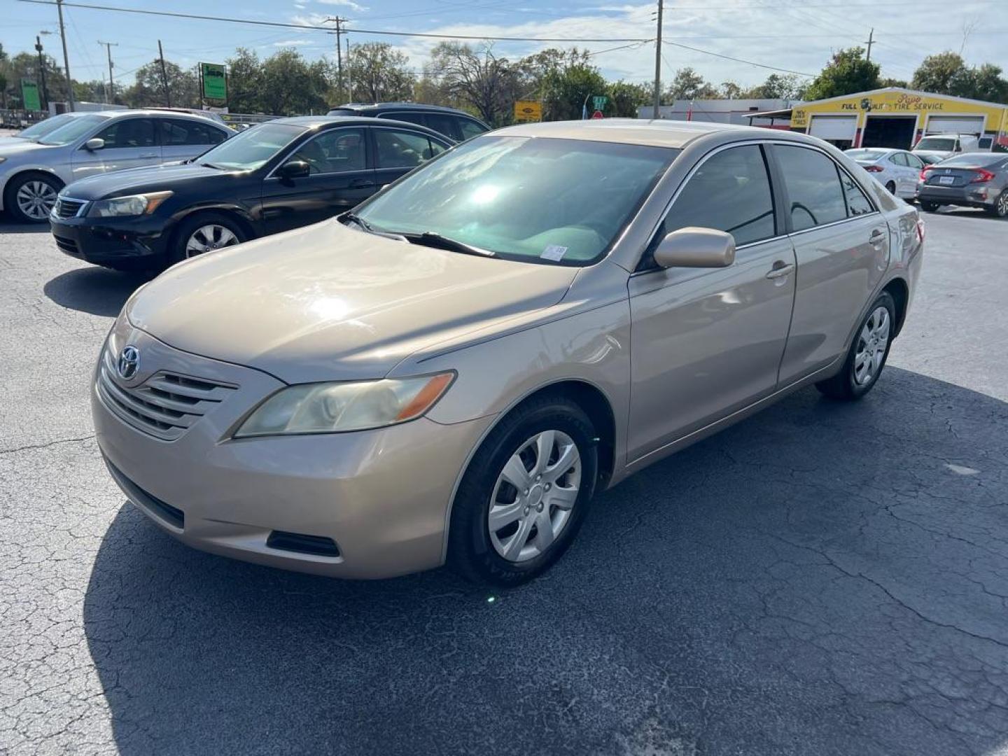 2008 GOLD TOYOTA CAMRY CE (4T1BE46K38U) with an 2.4L engine, Automatic transmission, located at 2929 9th St. West, Bradenton, 34205, (941) 242-2810, 27.473591, -82.570679 - Photo#3