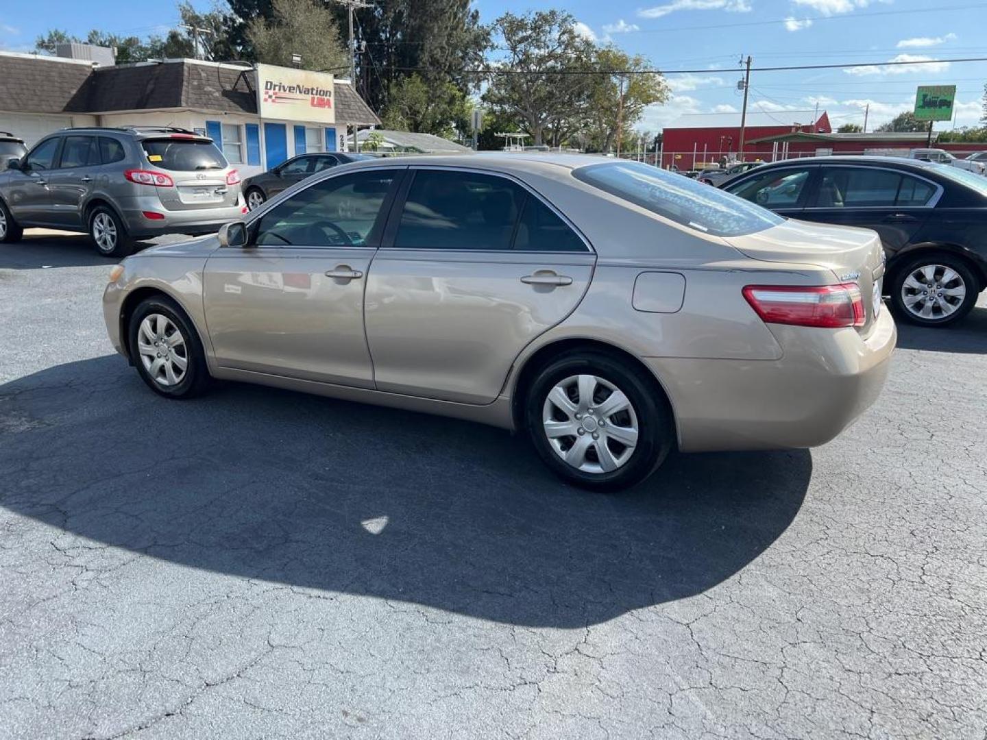 2008 GOLD TOYOTA CAMRY CE (4T1BE46K38U) with an 2.4L engine, Automatic transmission, located at 2929 9th St. West, Bradenton, 34205, (941) 242-2810, 27.473591, -82.570679 - Photo#4