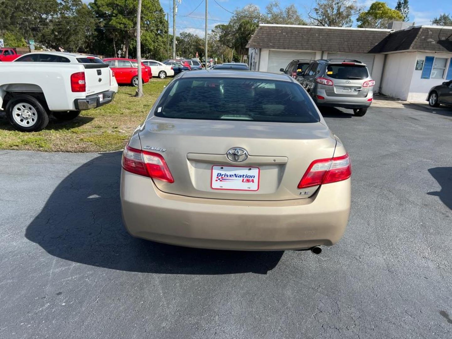 2008 GOLD TOYOTA CAMRY CE (4T1BE46K38U) with an 2.4L engine, Automatic transmission, located at 2929 9th St. West, Bradenton, 34205, (941) 242-2810, 27.473591, -82.570679 - Photo#5