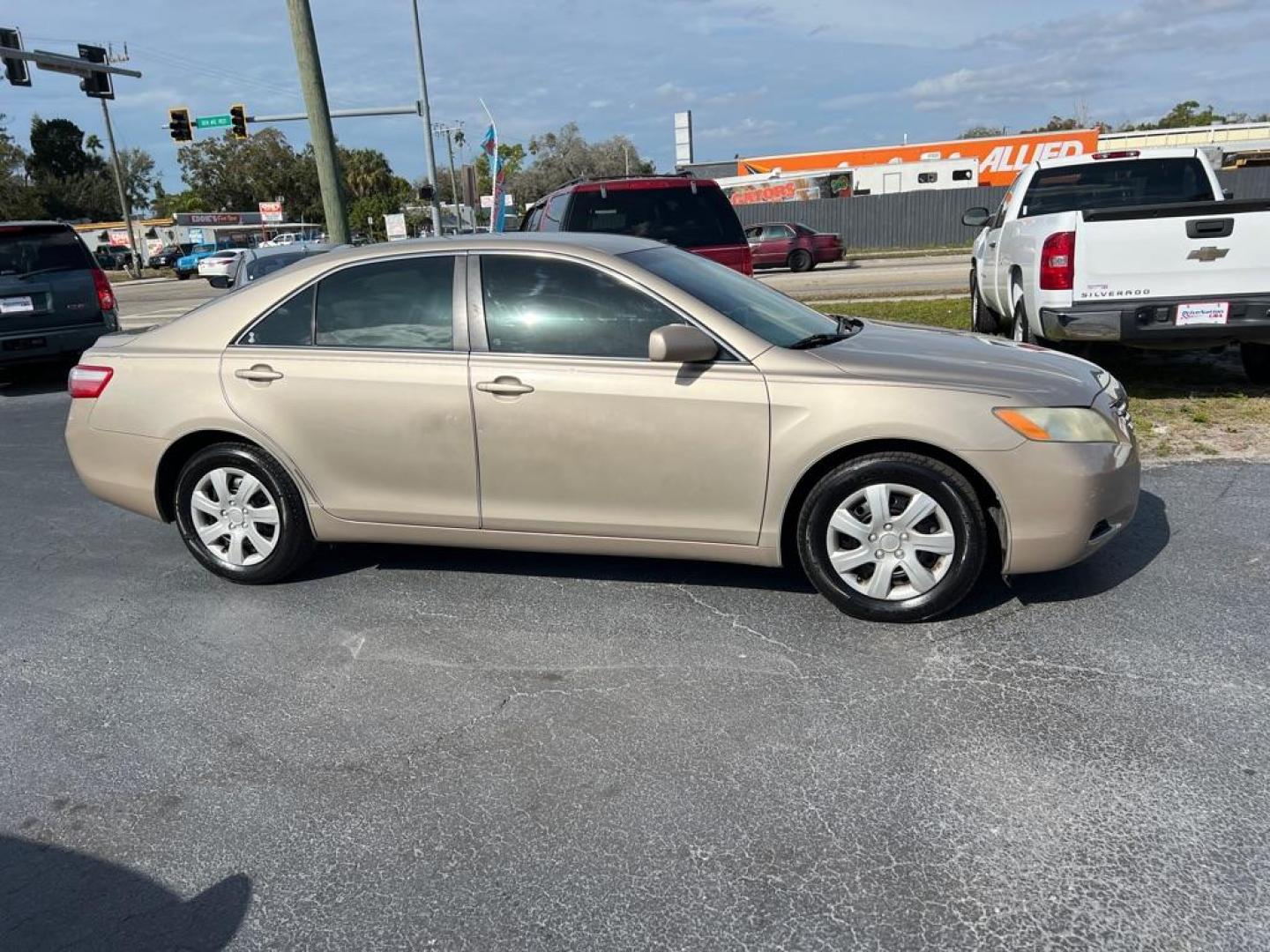 2008 GOLD TOYOTA CAMRY CE (4T1BE46K38U) with an 2.4L engine, Automatic transmission, located at 2929 9th St. West, Bradenton, 34205, (941) 242-2810, 27.473591, -82.570679 - Photo#7