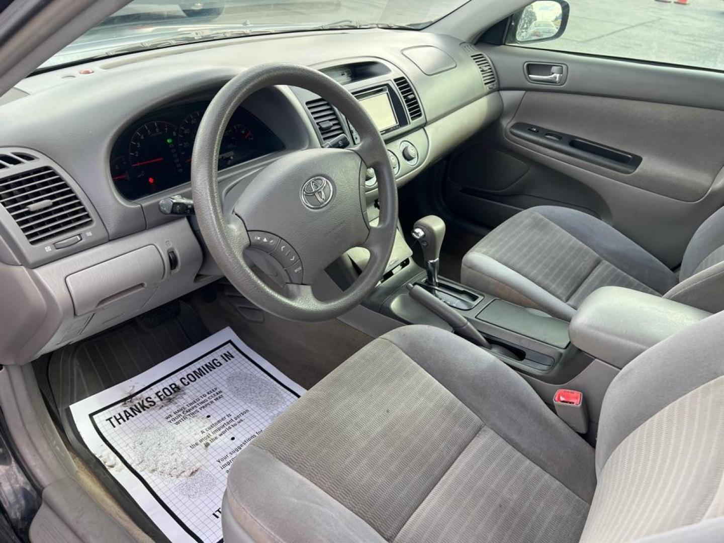 2005 BLACK TOYOTA CAMRY LE (4T1BE32K75U) with an 2.4L engine, Automatic transmission, located at 2929 9th St. West, Bradenton, 34205, (941) 242-2810, 27.473591, -82.570679 - Photo#9