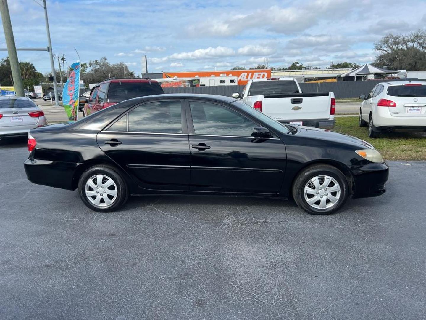 2005 BLACK TOYOTA CAMRY LE (4T1BE32K75U) with an 2.4L engine, Automatic transmission, located at 2929 9th St. West, Bradenton, 34205, (941) 242-2810, 27.473591, -82.570679 - Photo#8