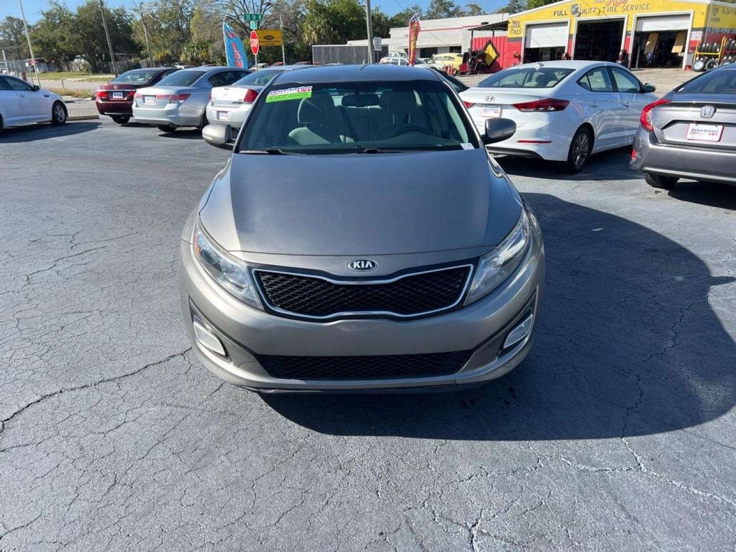 2015 GRAY KIA OPTIMA LX (5XXGM4A74FG) with an 2.4L engine, Automatic transmission, located at 2929 9th St. West, Bradenton, 34205, (941) 242-2810, 27.473591, -82.570679 - Photo#2