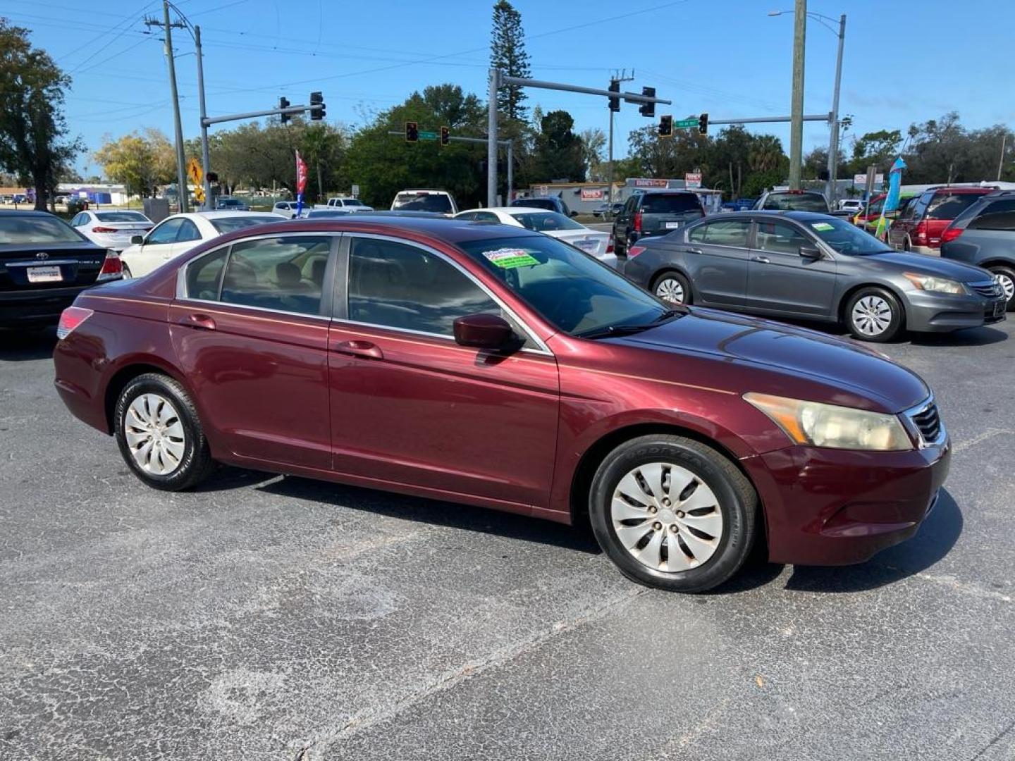 2010 MAROON HONDA ACCORD LX (1HGCP2F31AA) with an 2.4L engine, Automatic transmission, located at 2929 9th St. West, Bradenton, 34205, (941) 242-2810, 27.473591, -82.570679 - Photo#0