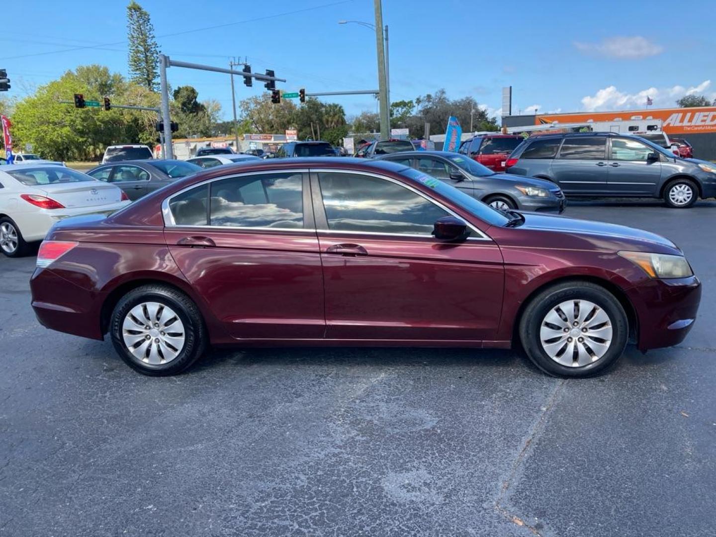 2010 MAROON HONDA ACCORD LX (1HGCP2F31AA) with an 2.4L engine, Automatic transmission, located at 2929 9th St. West, Bradenton, 34205, (941) 242-2810, 27.473591, -82.570679 - Photo#1