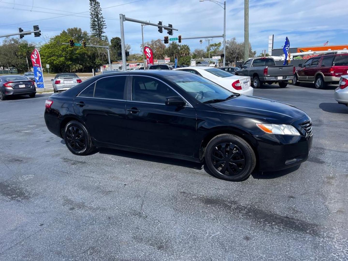 2009 BLACK TOYOTA CAMRY LE (4T1BE46K69U) with an 2.4L engine, Automatic transmission, located at 2929 9th St. West, Bradenton, 34205, (941) 242-2810, 27.473591, -82.570679 - Photo#0