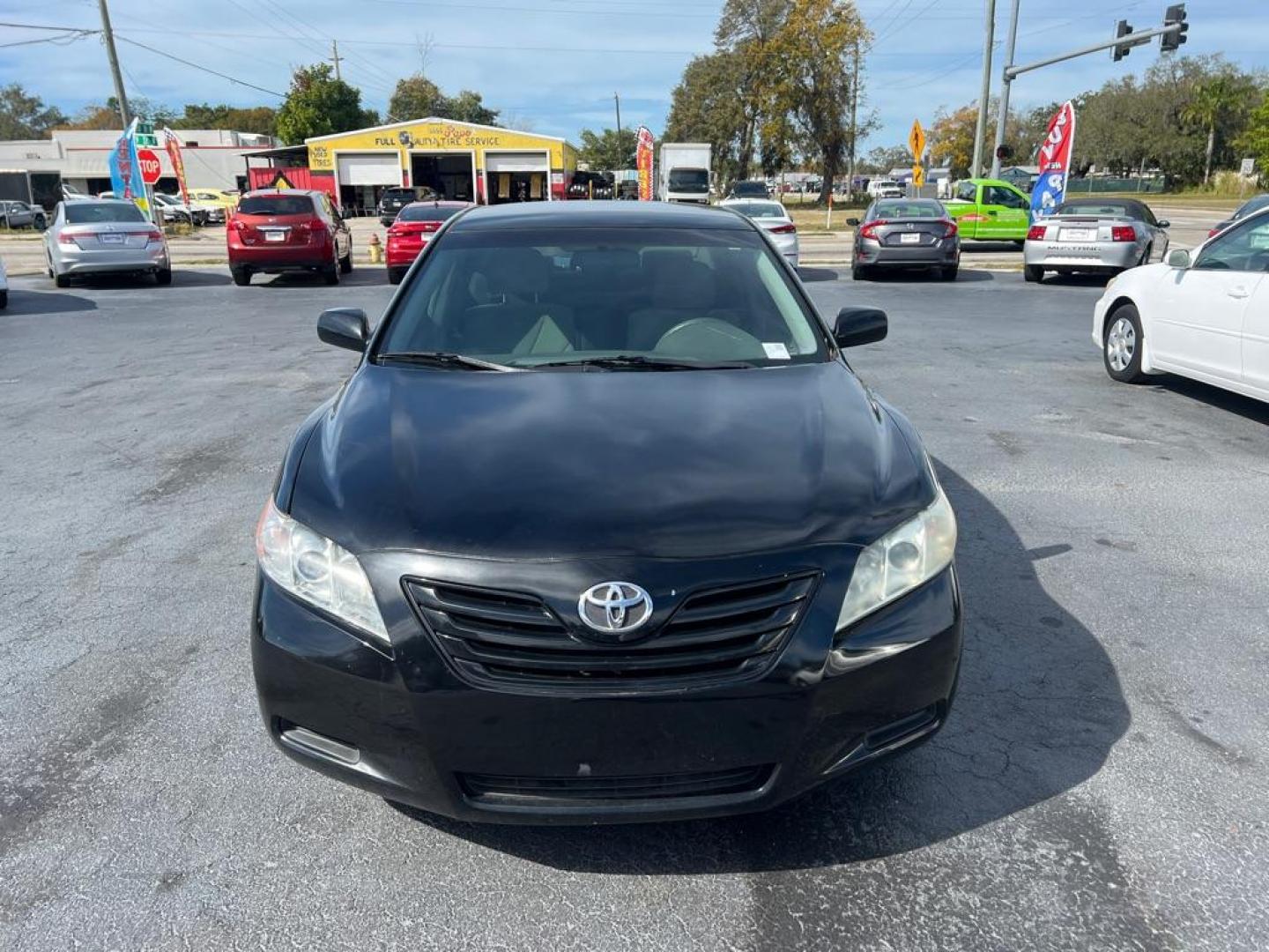 2009 BLACK TOYOTA CAMRY LE (4T1BE46K69U) with an 2.4L engine, Automatic transmission, located at 2929 9th St. West, Bradenton, 34205, (941) 242-2810, 27.473591, -82.570679 - Photo#2