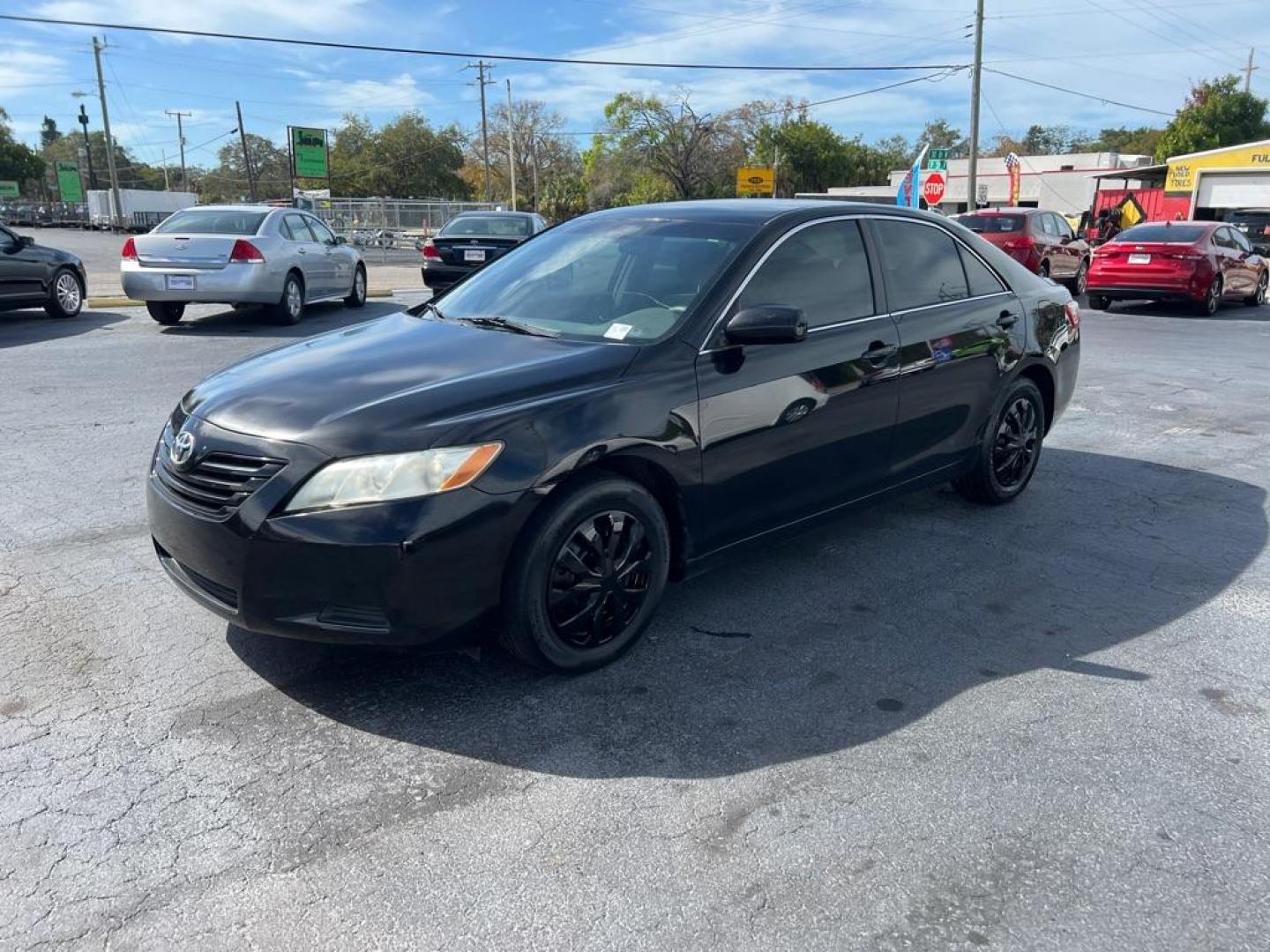 2009 BLACK TOYOTA CAMRY LE (4T1BE46K69U) with an 2.4L engine, Automatic transmission, located at 2929 9th St. West, Bradenton, 34205, (941) 242-2810, 27.473591, -82.570679 - Photo#3