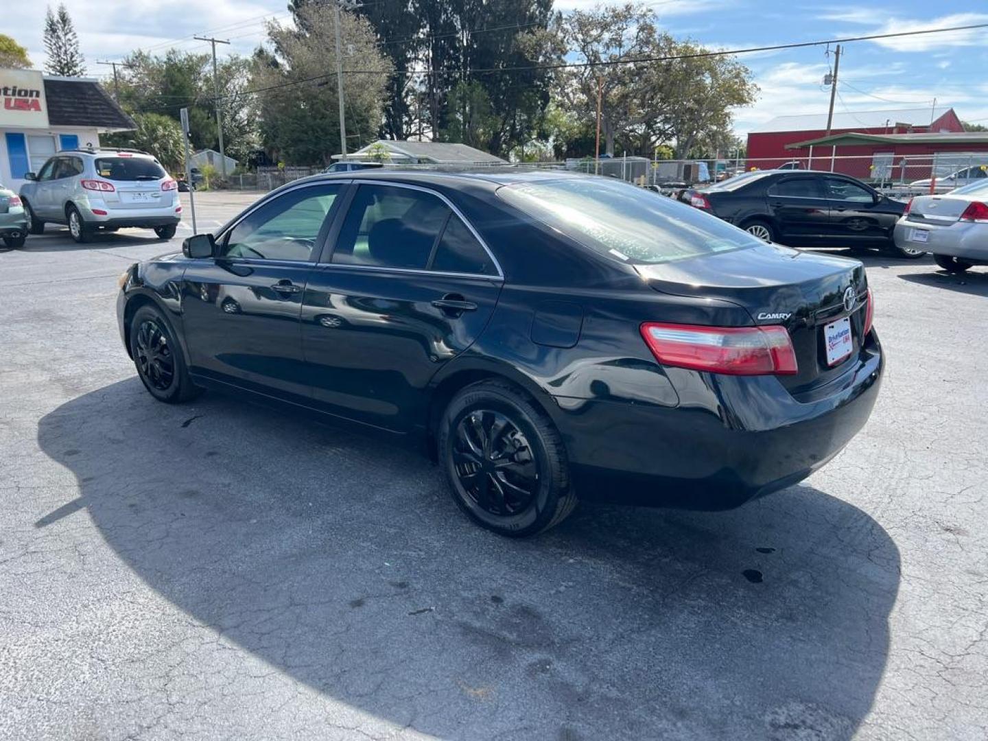 2009 BLACK TOYOTA CAMRY LE (4T1BE46K69U) with an 2.4L engine, Automatic transmission, located at 2929 9th St. West, Bradenton, 34205, (941) 242-2810, 27.473591, -82.570679 - Photo#4