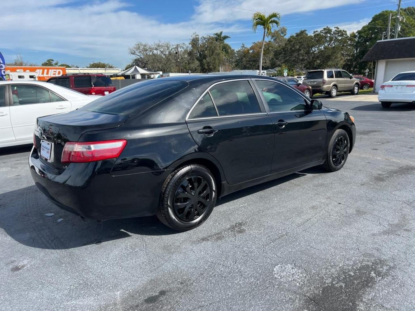 2009 BLACK TOYOTA CAMRY LE (4T1BE46K69U) with an 2.4L engine, Automatic transmission, located at 2929 9th St. West, Bradenton, 34205, (941) 242-2810, 27.473591, -82.570679 - Photo#6