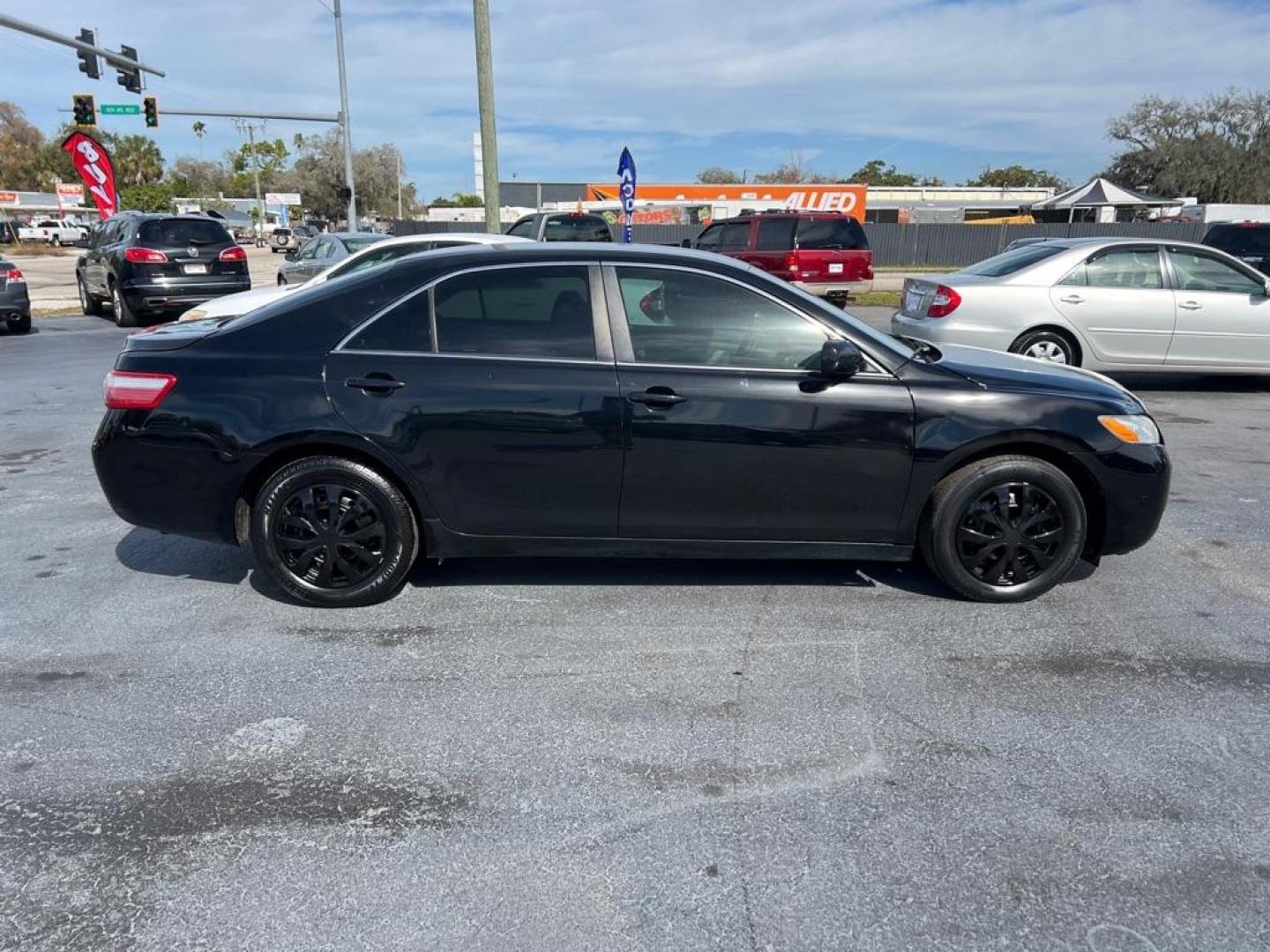 2009 BLACK TOYOTA CAMRY LE (4T1BE46K69U) with an 2.4L engine, Automatic transmission, located at 2929 9th St. West, Bradenton, 34205, (941) 242-2810, 27.473591, -82.570679 - Photo#7