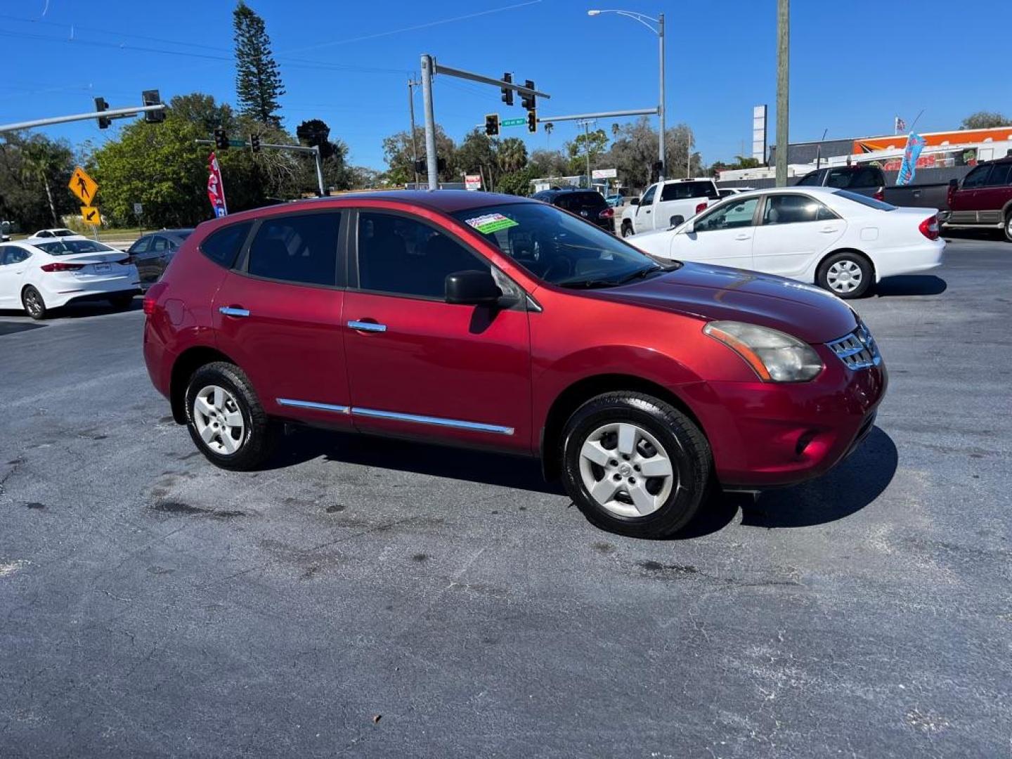 2015 RED NISSAN ROGUE SELECT S (JN8AS5MTXFW) with an 2.5L engine, Continuously Variable transmission, located at 2929 9th St. West, Bradenton, 34205, (941) 242-2810, 27.473591, -82.570679 - Photo#1