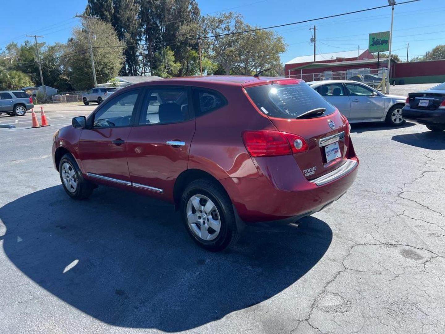 2015 RED NISSAN ROGUE SELECT S (JN8AS5MTXFW) with an 2.5L engine, Continuously Variable transmission, located at 2929 9th St. West, Bradenton, 34205, (941) 242-2810, 27.473591, -82.570679 - Photo#5