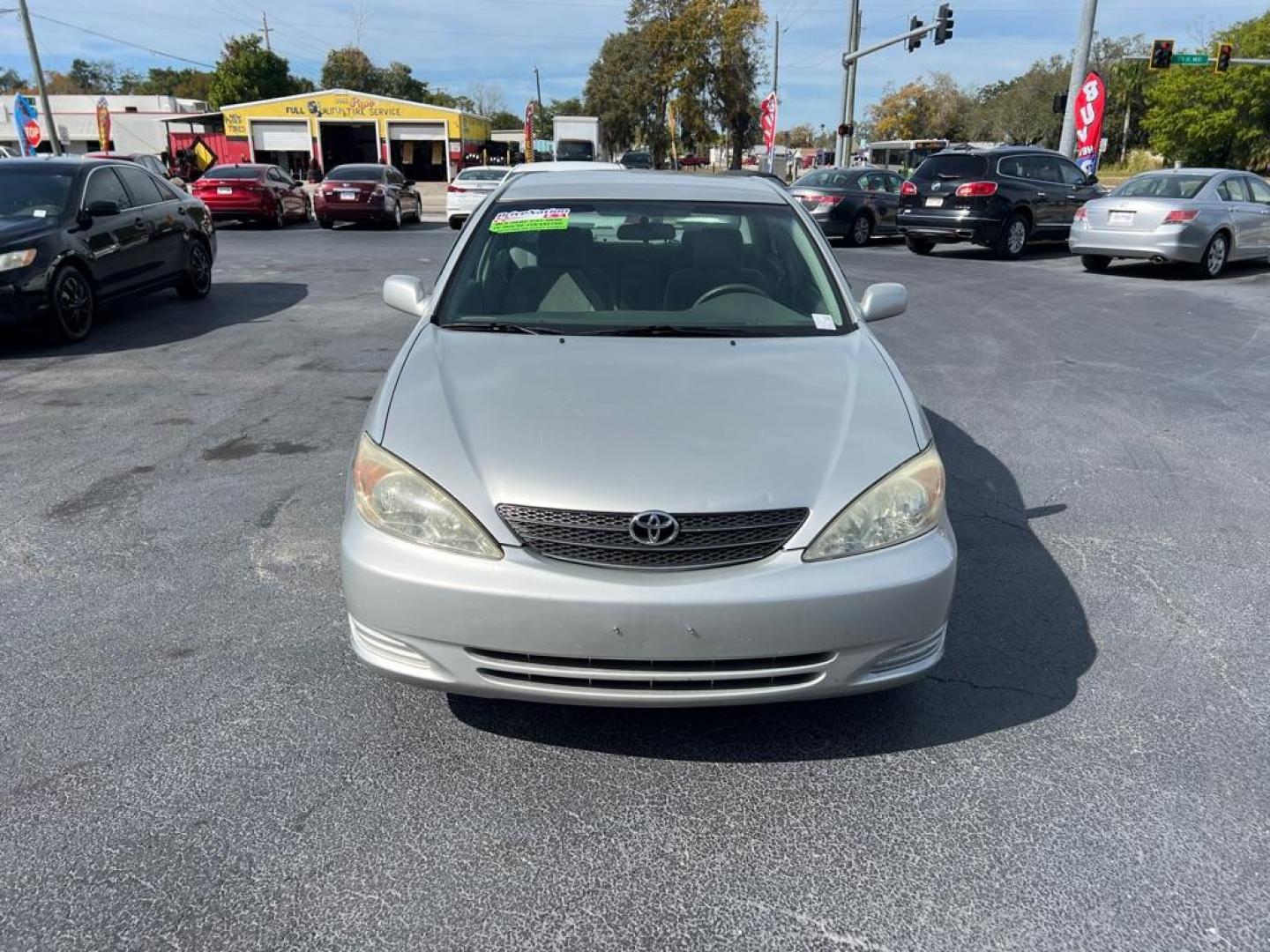 2004 SILVER TOYOTA CAMRY LE (4T1BE30K54U) with an 2.4L engine, Automatic transmission, located at 2929 9th St. West, Bradenton, 34205, (941) 242-2810, 27.473591, -82.570679 - Photo#2