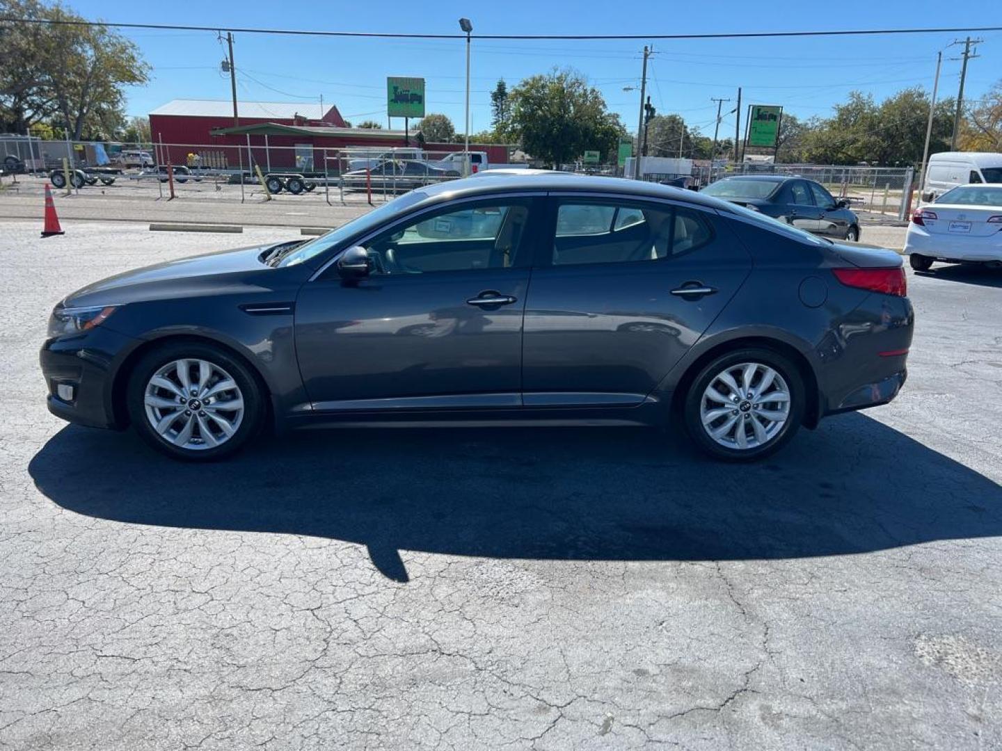 2015 GRAY KIA OPTIMA LX (KNAGM4A70F5) with an 2.4L engine, Automatic transmission, located at 2929 9th St. West, Bradenton, 34205, (941) 242-2810, 27.473591, -82.570679 - Thanks for inquring into DriveNation USA! All vehicles listed can be viewed at www.drivenationusa.com for vehicle history reports and additonal info. We cannot quote any terms such as down payments or monthly payments without an application. You can apply directly at www.drivenationusa.com or by con - Photo#4