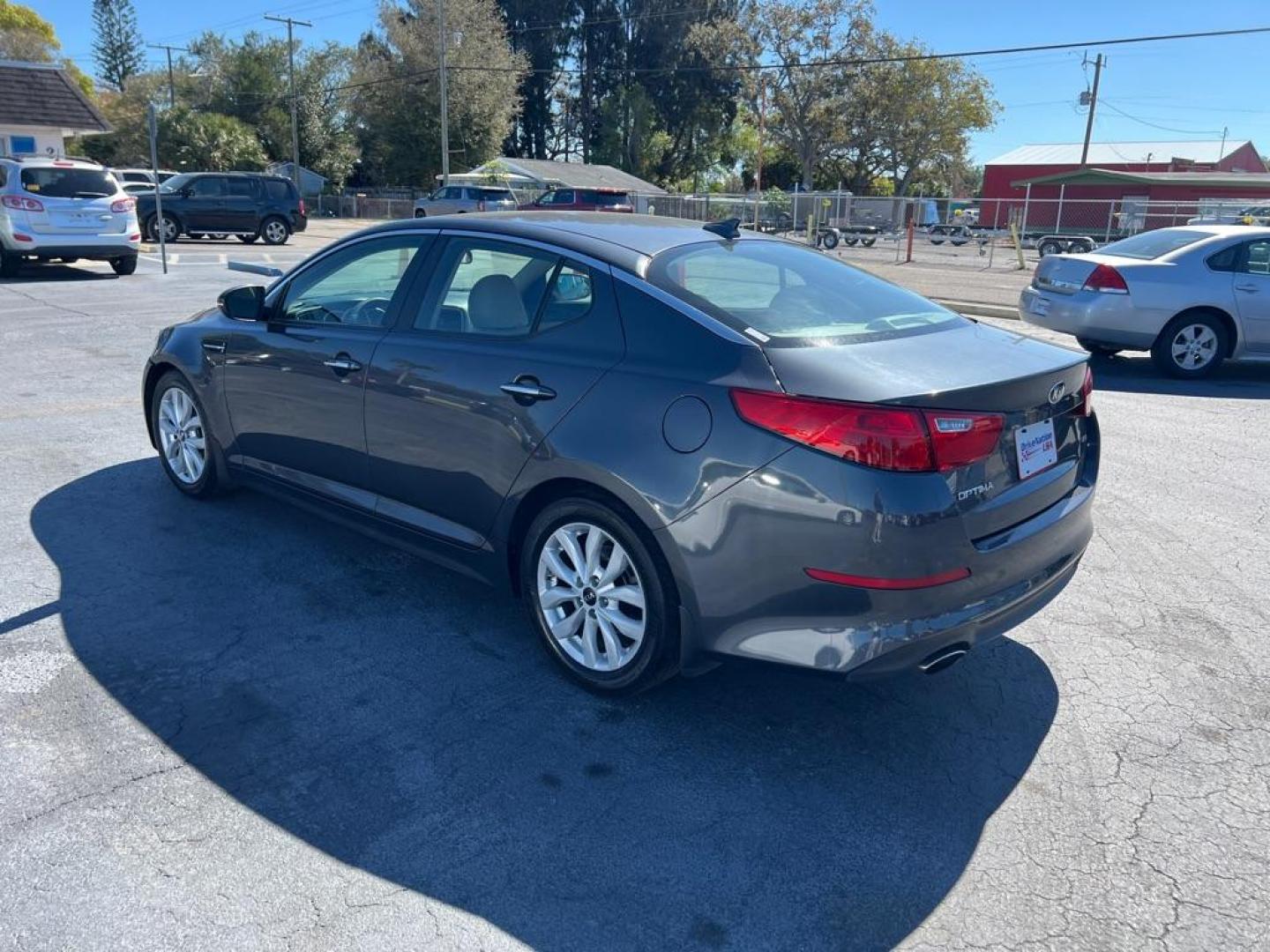 2015 GRAY KIA OPTIMA LX (KNAGM4A70F5) with an 2.4L engine, Automatic transmission, located at 2929 9th St. West, Bradenton, 34205, (941) 242-2810, 27.473591, -82.570679 - Thanks for inquring into DriveNation USA! All vehicles listed can be viewed at www.drivenationusa.com for vehicle history reports and additonal info. We cannot quote any terms such as down payments or monthly payments without an application. You can apply directly at www.drivenationusa.com or by con - Photo#5