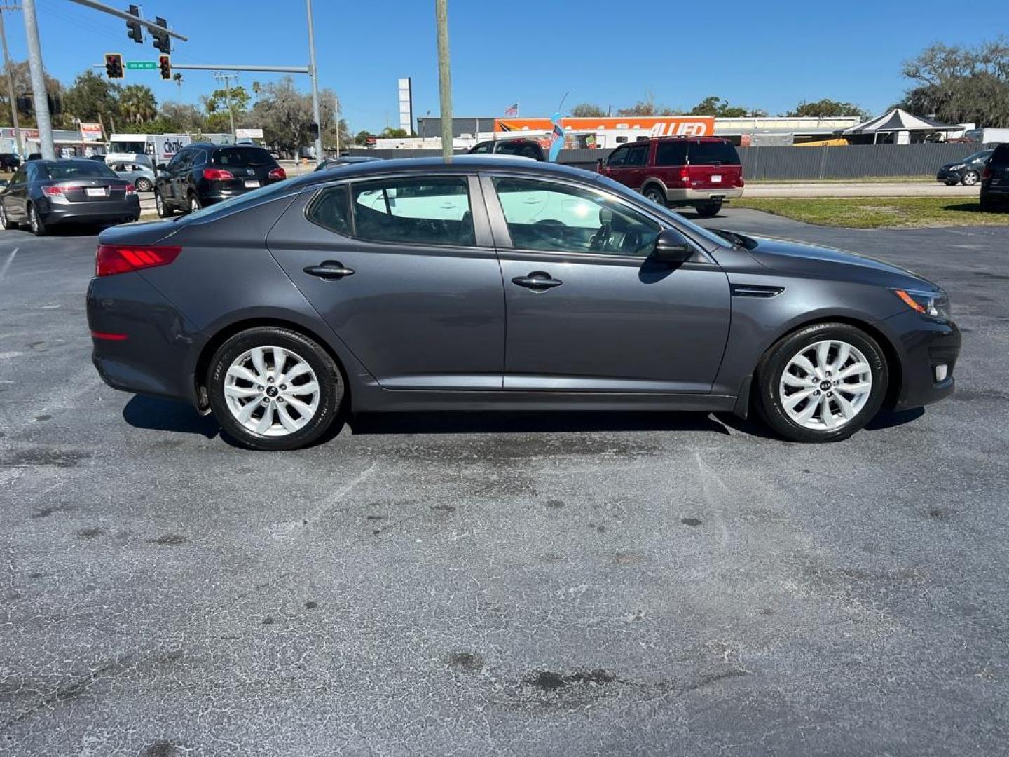 2015 GRAY KIA OPTIMA LX (KNAGM4A70F5) with an 2.4L engine, Automatic transmission, located at 2929 9th St. West, Bradenton, 34205, (941) 242-2810, 27.473591, -82.570679 - Thanks for inquring into DriveNation USA! All vehicles listed can be viewed at www.drivenationusa.com for vehicle history reports and additonal info. We cannot quote any terms such as down payments or monthly payments without an application. You can apply directly at www.drivenationusa.com or by con - Photo#8