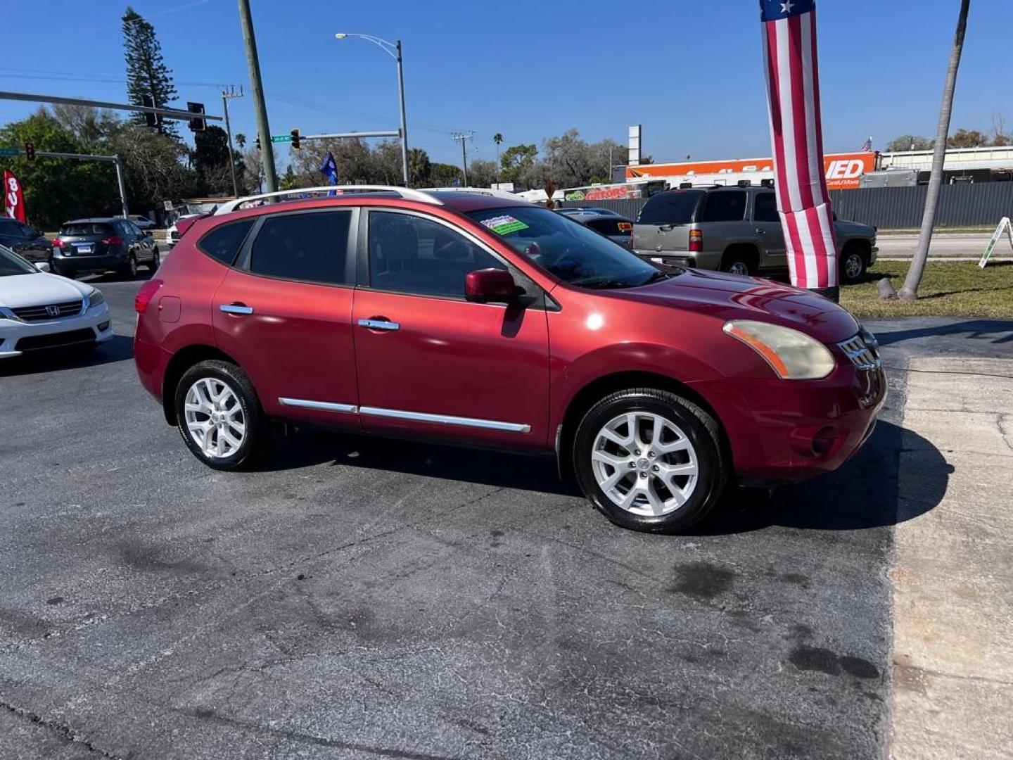 2013 RED NISSAN ROGUE S (JN8AS5MT3DW) with an 2.5L engine, Continuously Variable transmission, located at 2929 9th St. West, Bradenton, 34205, (941) 242-2810, 27.473591, -82.570679 - Photo#0