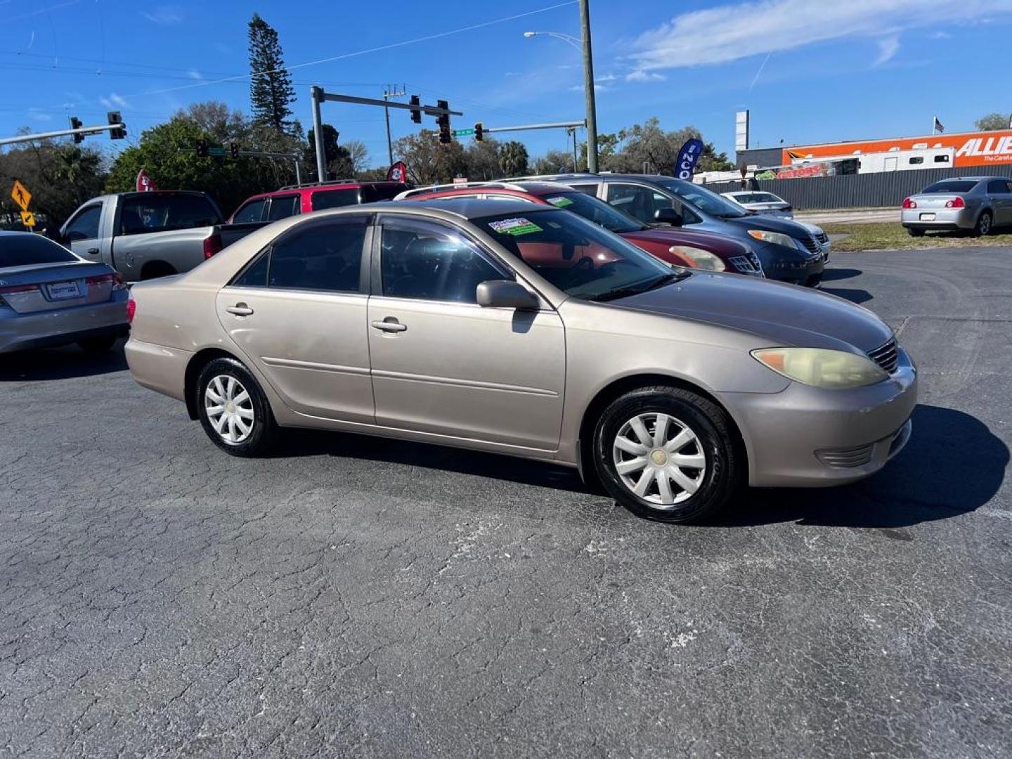 2005 TAN TOYOTA CAMRY LE (4T1BE32K55U) with an 2.4L engine, Automatic transmission, located at 2929 9th St. West, Bradenton, 34205, (941) 242-2810, 27.473591, -82.570679 - Photo#0