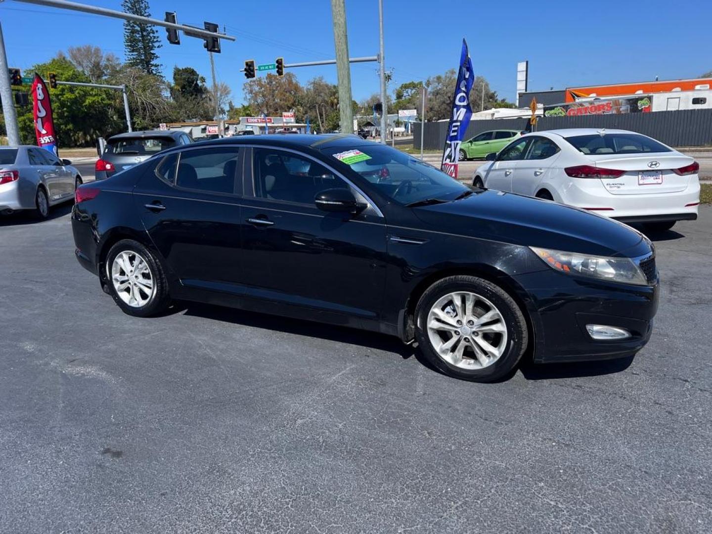 2012 BLACK KIA OPTIMA EX (5XXGN4A72CG) with an 2.4L engine, Automatic transmission, located at 2929 9th St. West, Bradenton, 34205, (941) 242-2810, 27.473591, -82.570679 - Photo#0