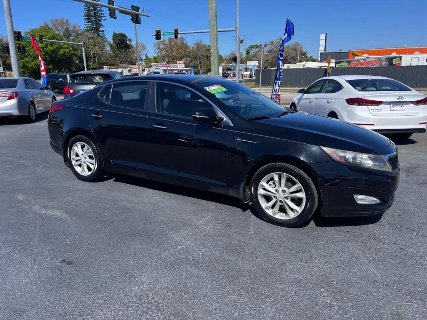 2012 BLACK KIA OPTIMA EX (5XXGN4A72CG) with an 2.4L engine, Automatic transmission, located at 2929 9th St. West, Bradenton, 34205, (941) 242-2810, 27.473591, -82.570679 - Photo#1