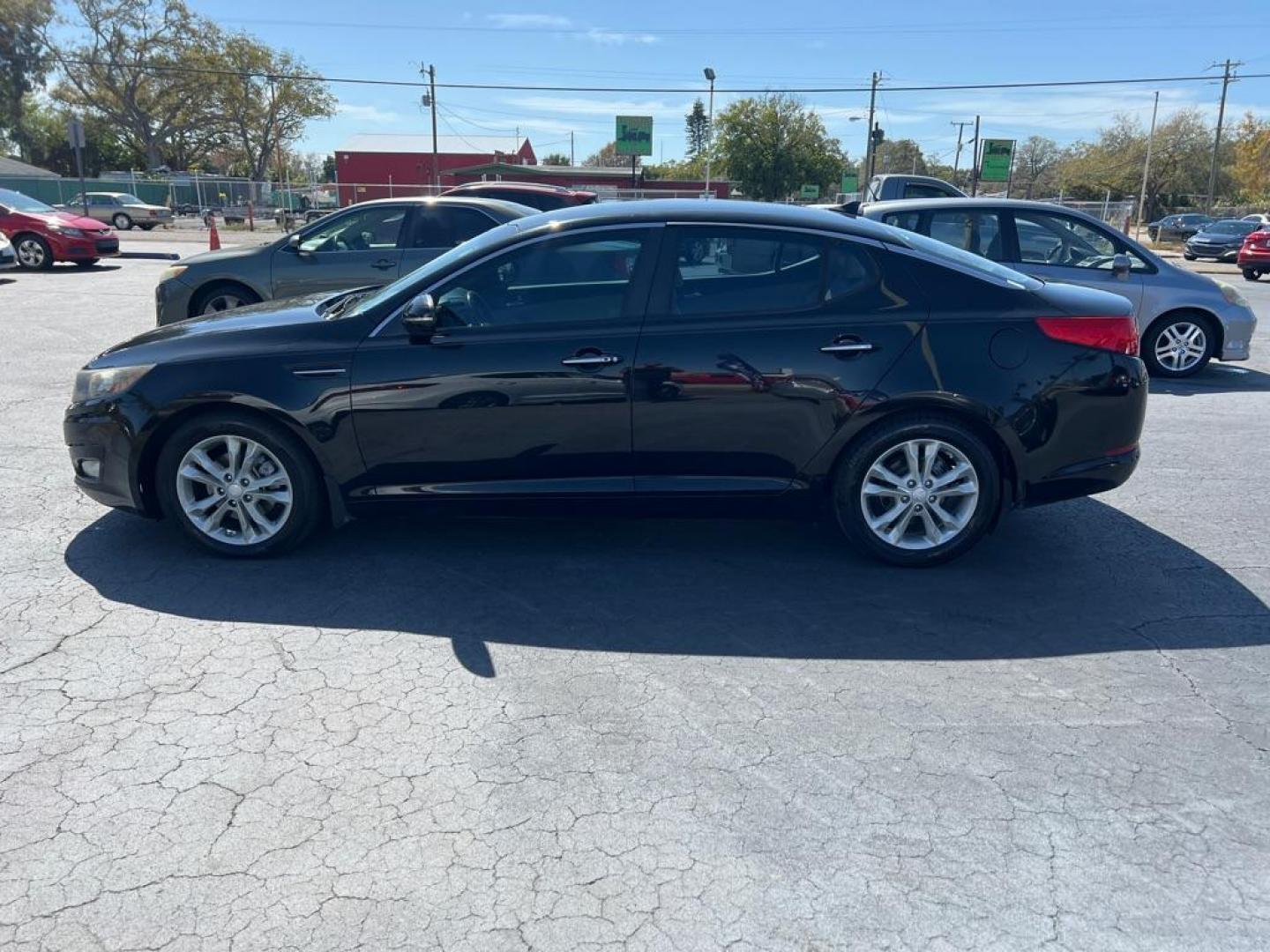 2012 BLACK KIA OPTIMA EX (5XXGN4A72CG) with an 2.4L engine, Automatic transmission, located at 2929 9th St. West, Bradenton, 34205, (941) 242-2810, 27.473591, -82.570679 - Photo#4