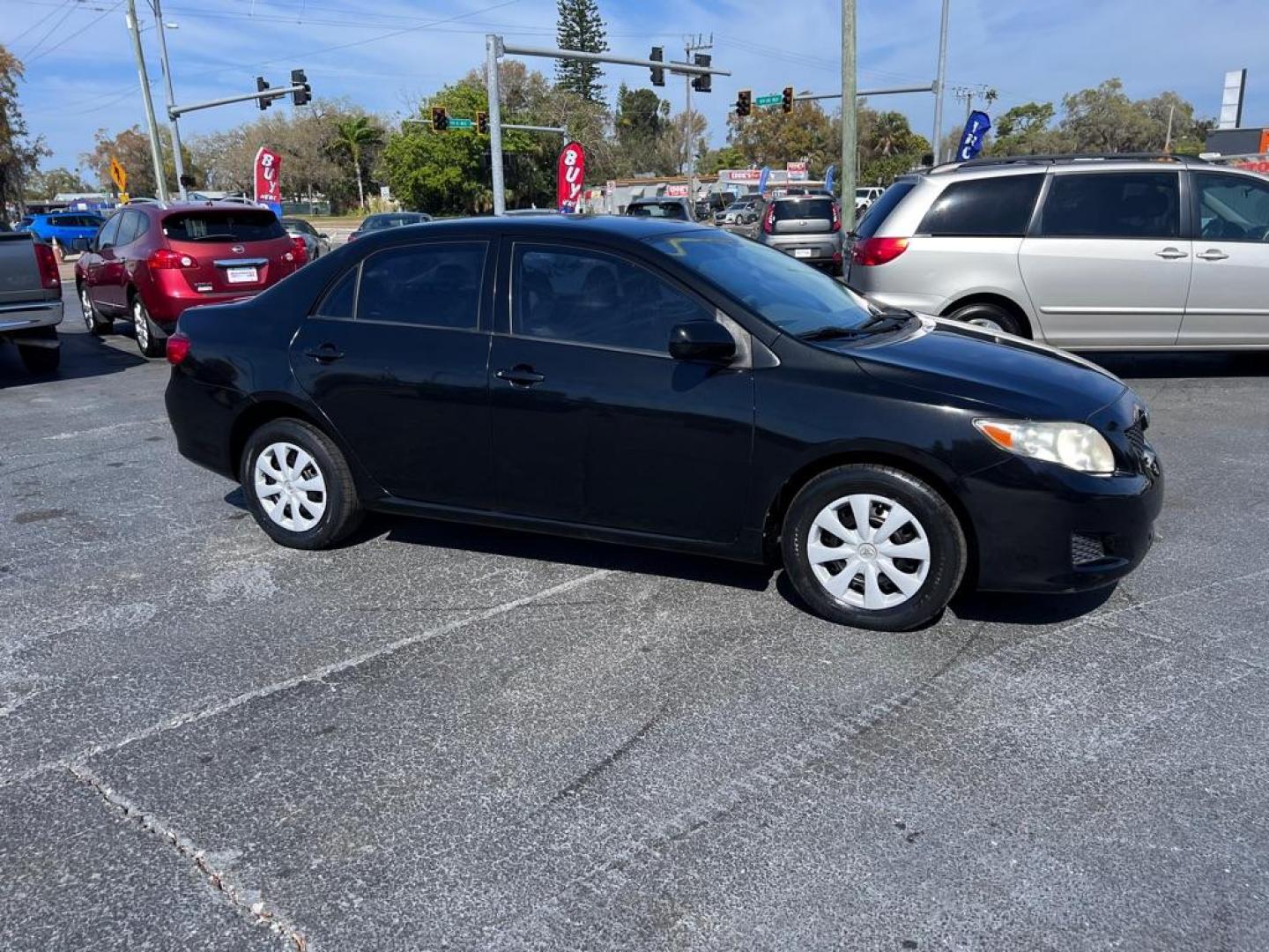 2009 BLACK TOYOTA COROLLA LE (JTDBL40E599) with an 1.8L engine, Automatic transmission, located at 2929 9th St. West, Bradenton, 34205, (941) 242-2810, 27.473591, -82.570679 - Photo#1