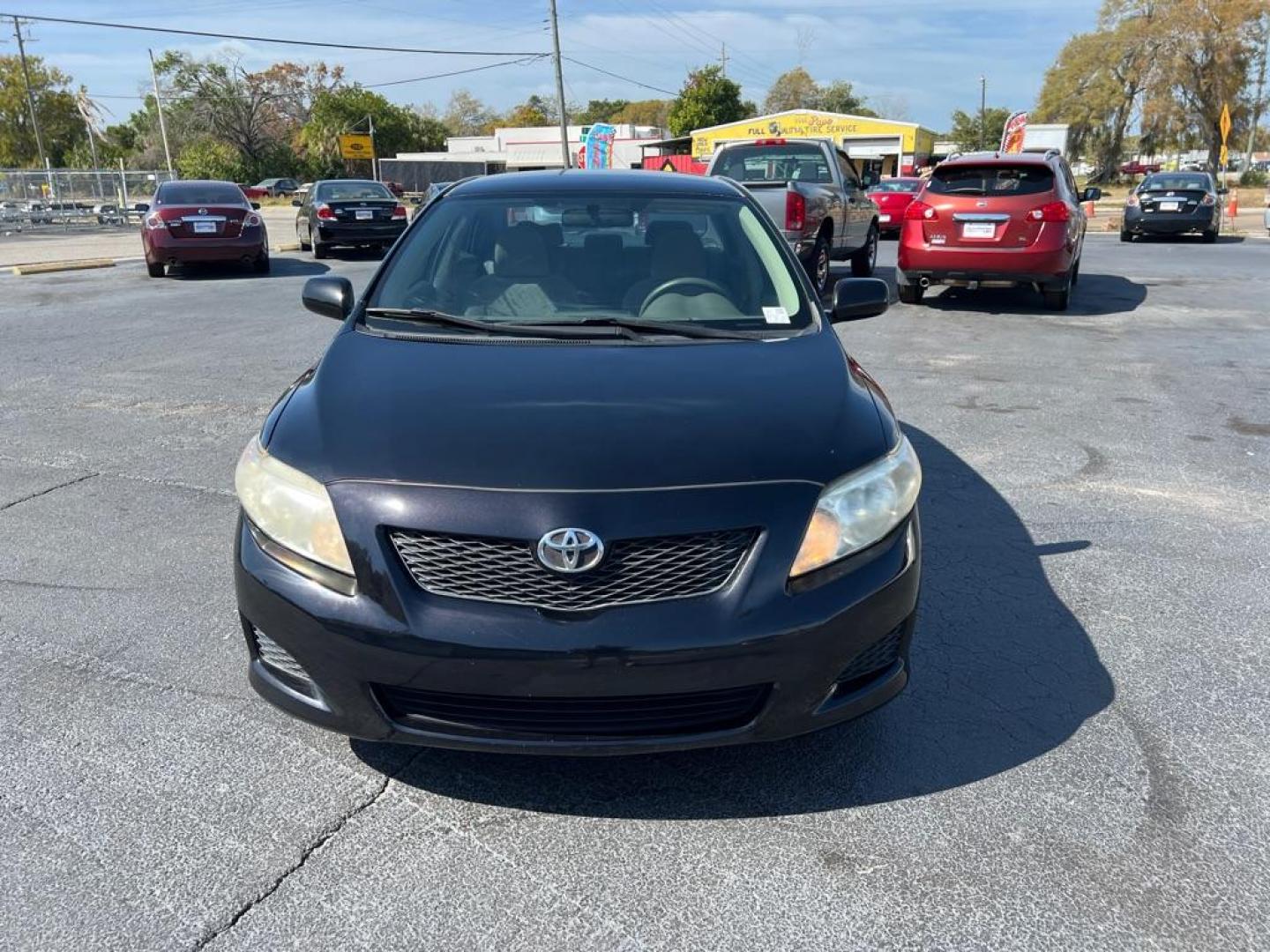 2009 BLACK TOYOTA COROLLA LE (JTDBL40E599) with an 1.8L engine, Automatic transmission, located at 2929 9th St. West, Bradenton, 34205, (941) 242-2810, 27.473591, -82.570679 - Photo#2