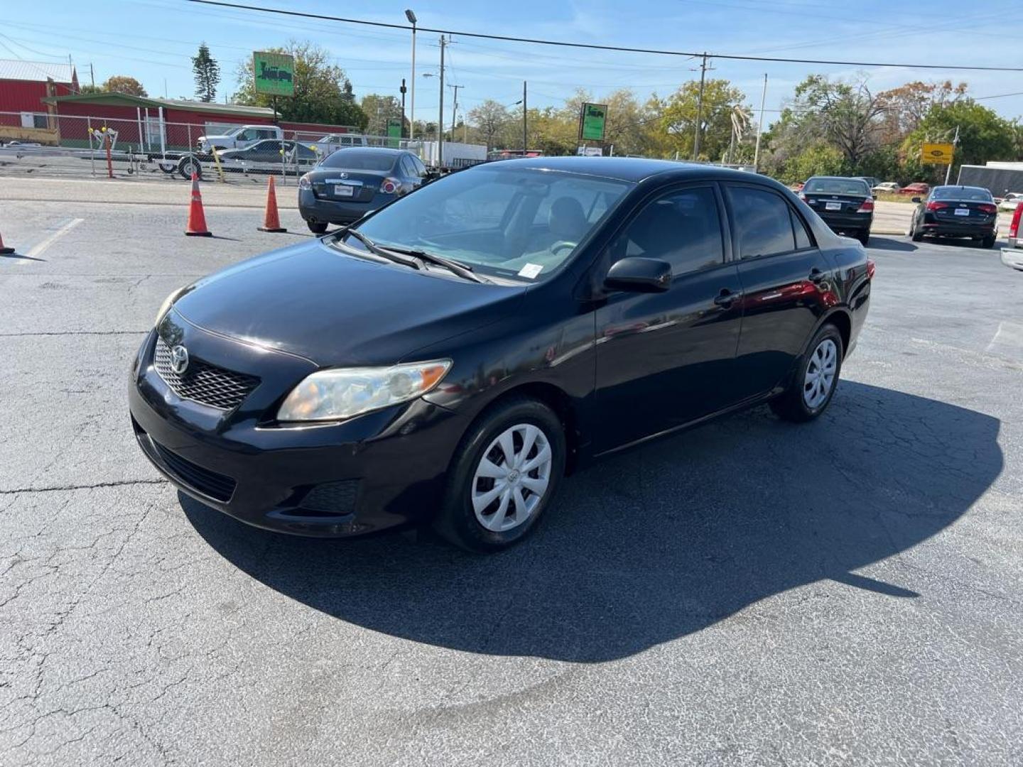 2009 BLACK TOYOTA COROLLA LE (JTDBL40E599) with an 1.8L engine, Automatic transmission, located at 2929 9th St. West, Bradenton, 34205, (941) 242-2810, 27.473591, -82.570679 - Photo#3