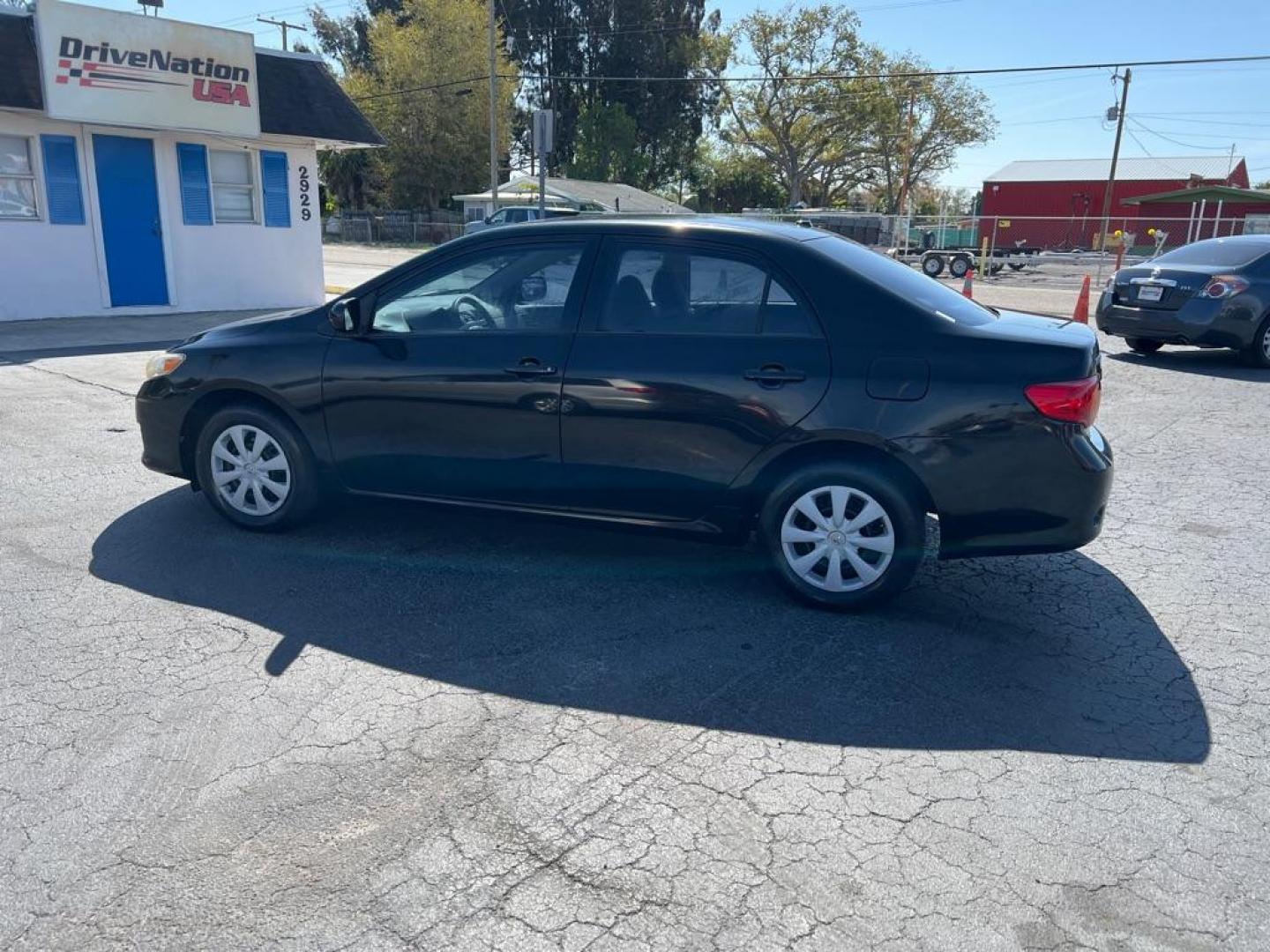 2009 BLACK TOYOTA COROLLA LE (JTDBL40E599) with an 1.8L engine, Automatic transmission, located at 2929 9th St. West, Bradenton, 34205, (941) 242-2810, 27.473591, -82.570679 - Photo#4