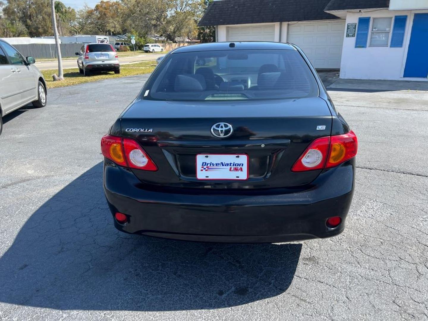 2009 BLACK TOYOTA COROLLA LE (JTDBL40E599) with an 1.8L engine, Automatic transmission, located at 2929 9th St. West, Bradenton, 34205, (941) 242-2810, 27.473591, -82.570679 - Photo#6