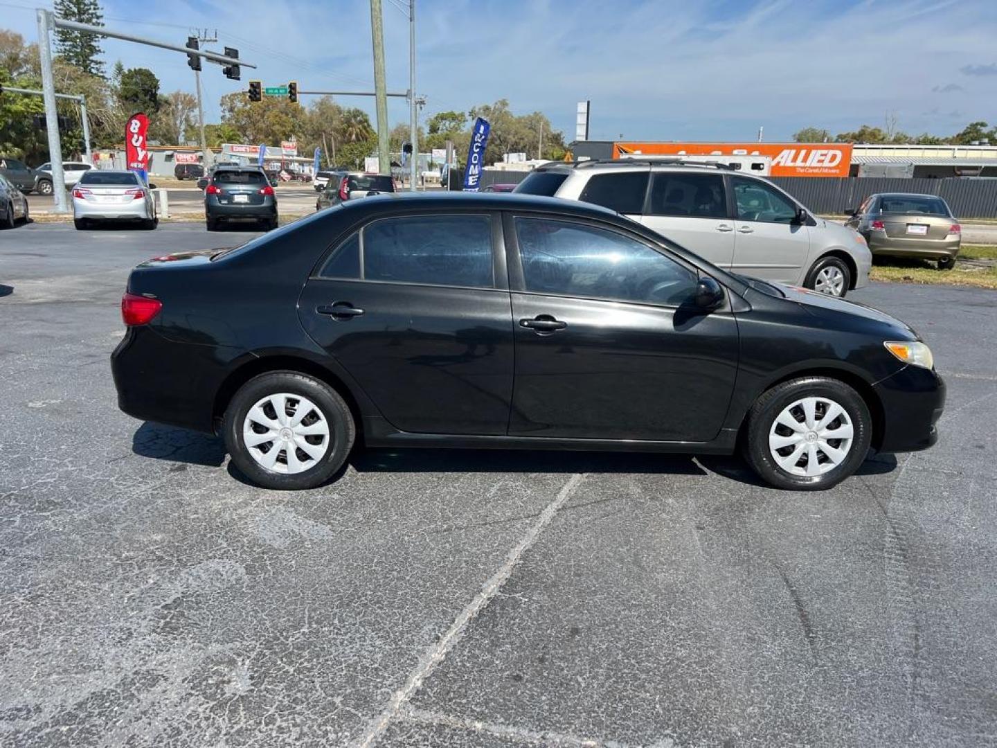 2009 BLACK TOYOTA COROLLA LE (JTDBL40E599) with an 1.8L engine, Automatic transmission, located at 2929 9th St. West, Bradenton, 34205, (941) 242-2810, 27.473591, -82.570679 - Photo#8