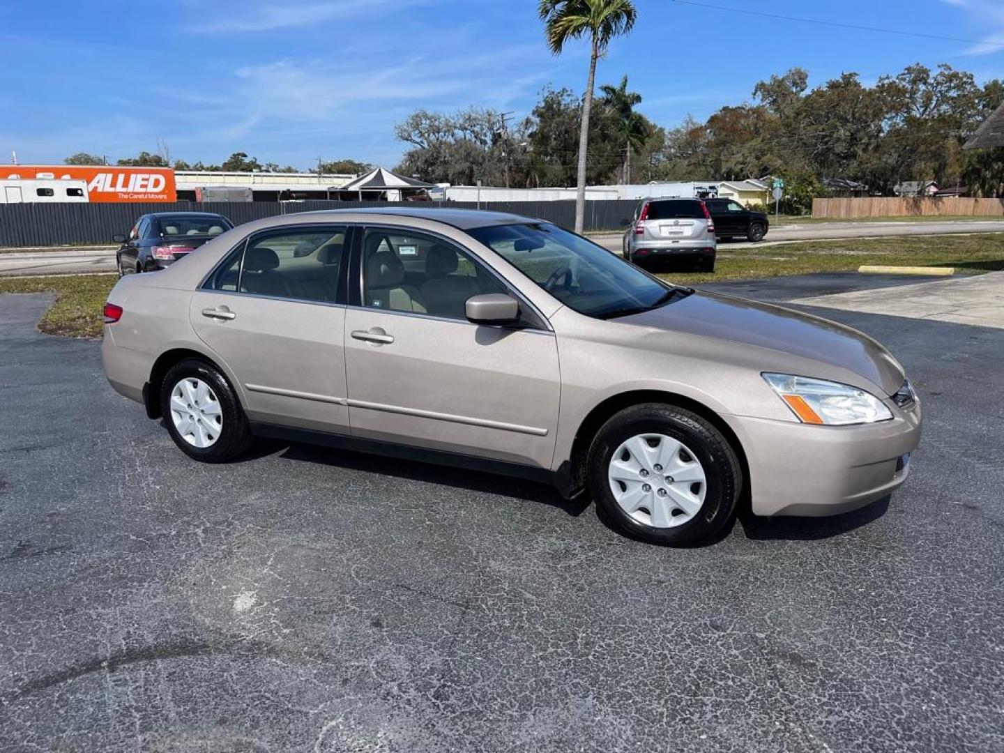 2004 GOLD HONDA ACCORD LX (JHMCM56414C) with an 2.4L engine, Automatic transmission, located at 2929 9th St. West, Bradenton, 34205, (941) 242-2810, 27.473591, -82.570679 - Photo#1