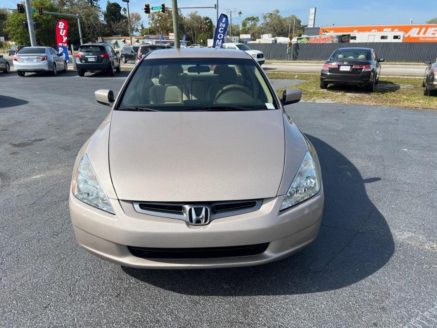 2004 GOLD HONDA ACCORD LX (JHMCM56414C) with an 2.4L engine, Automatic transmission, located at 2929 9th St. West, Bradenton, 34205, (941) 242-2810, 27.473591, -82.570679 - Photo#2