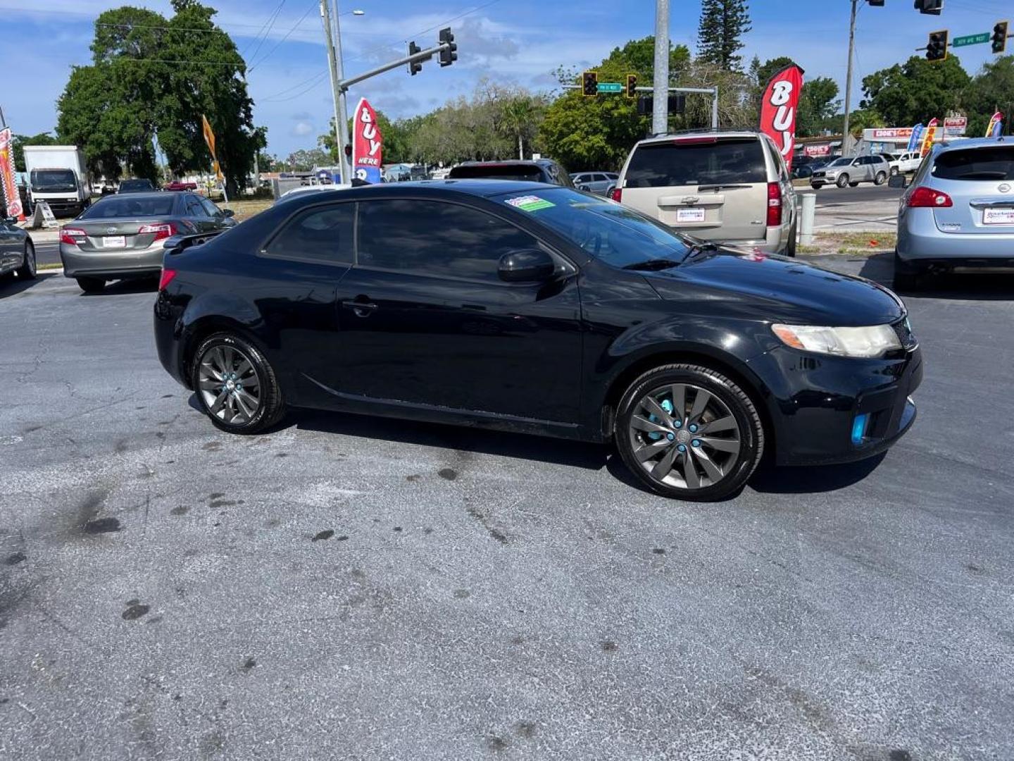 2013 BLACK KIA FORTE SX (KNAFW6A39D5) with an 2.4L engine, Automatic transmission, located at 2929 9th St. West, Bradenton, 34205, (941) 242-2810, 27.473591, -82.570679 - Thanks for inquring into DriveNation USA! All vehicles listed can be viewed at www.drivenationusa.com for vehicle history reports and additonal info. We cannot quote any terms such as down payments or monthly payments without an application. You can apply directly at www.drivenationusa.com or by con - Photo#0