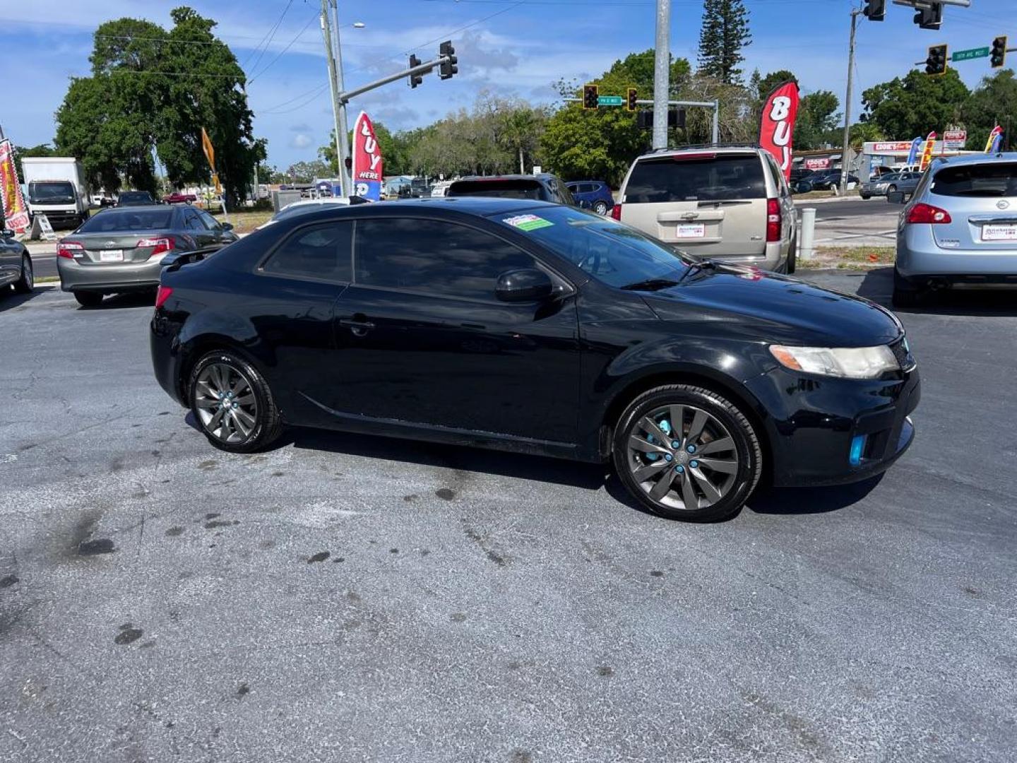 2013 BLACK KIA FORTE SX (KNAFW6A39D5) with an 2.4L engine, Automatic transmission, located at 2929 9th St. West, Bradenton, 34205, (941) 242-2810, 27.473591, -82.570679 - Thanks for inquring into DriveNation USA! All vehicles listed can be viewed at www.drivenationusa.com for vehicle history reports and additonal info. We cannot quote any terms such as down payments or monthly payments without an application. You can apply directly at www.drivenationusa.com or by con - Photo#1