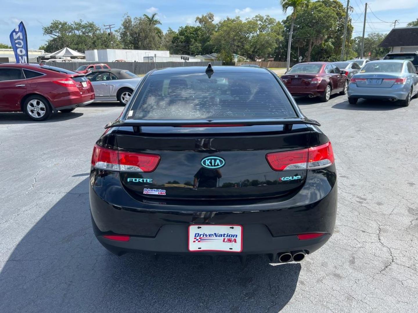 2013 BLACK KIA FORTE SX (KNAFW6A39D5) with an 2.4L engine, Automatic transmission, located at 2929 9th St. West, Bradenton, 34205, (941) 242-2810, 27.473591, -82.570679 - Thanks for inquring into DriveNation USA! All vehicles listed can be viewed at www.drivenationusa.com for vehicle history reports and additonal info. We cannot quote any terms such as down payments or monthly payments without an application. You can apply directly at www.drivenationusa.com or by con - Photo#5